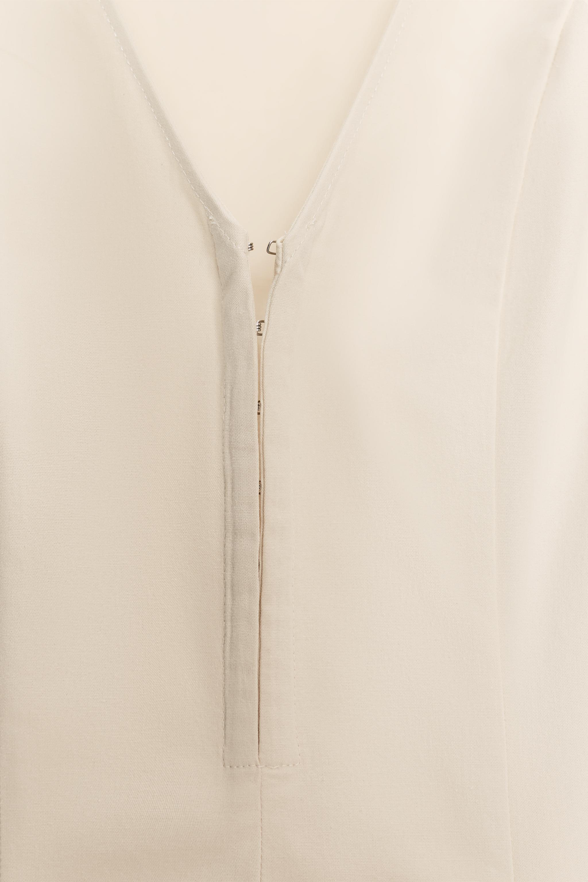 ROBE COURTE JUPE ÉVASÉE