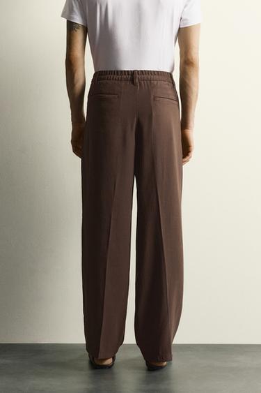 PANTALON FLUIDE COUPE DÉCONTRACTÉE À PLIS - Marron de Zara - Image 2