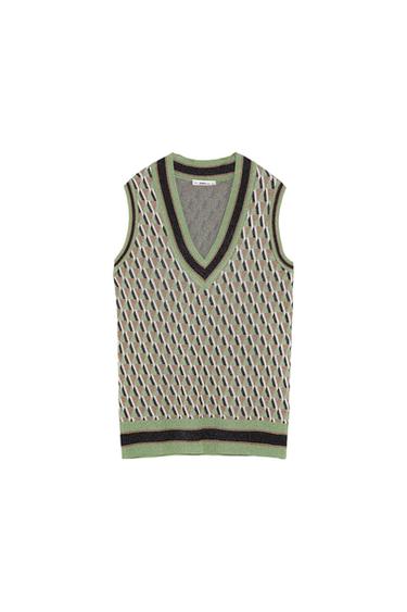 Sleeveless gilet with geometric pattern in green, brown, and black tones. V-neck and ribbed trim. "ZARA MAN" label.