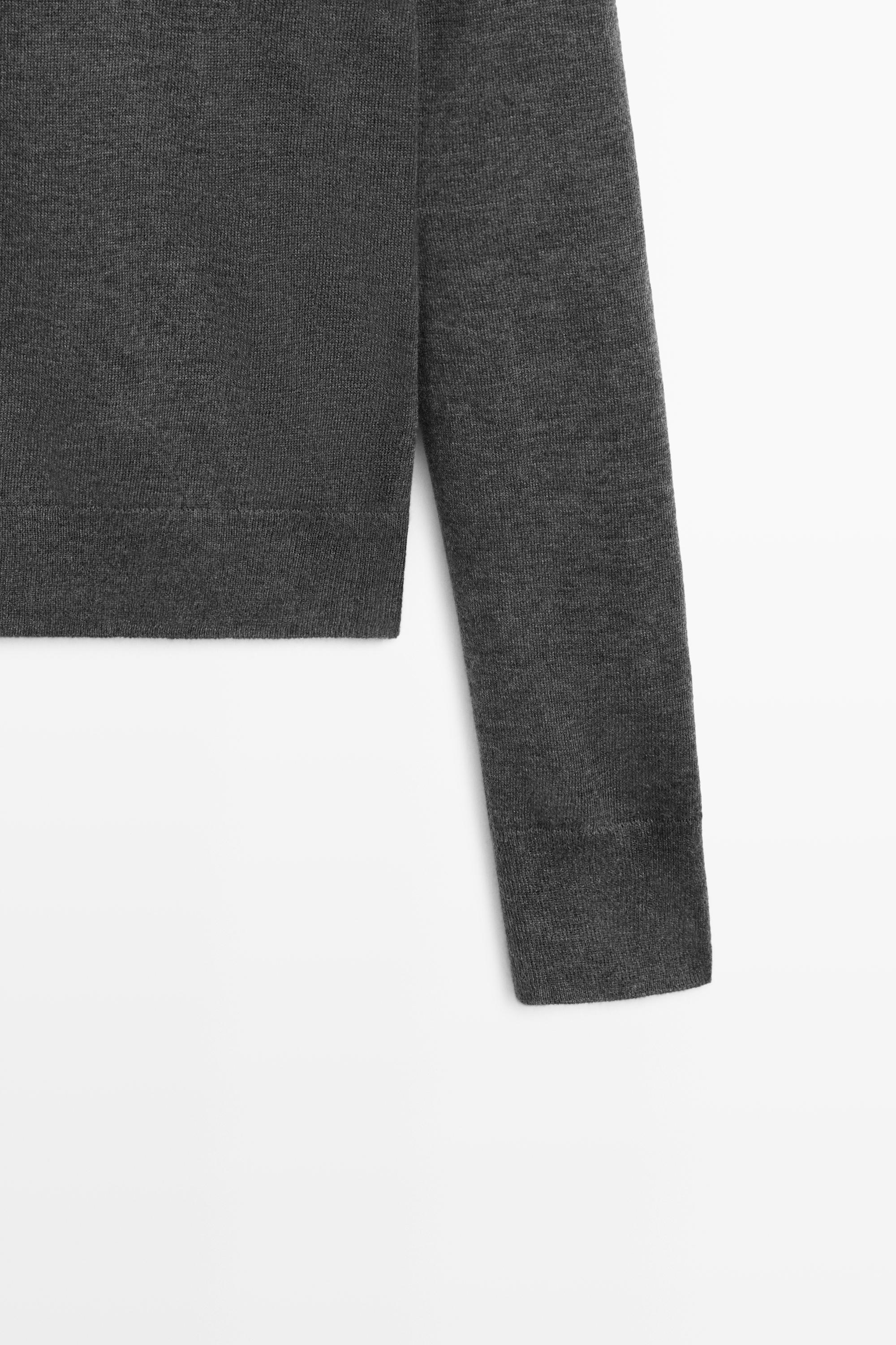 Wool-blend turtleneck knit sweater