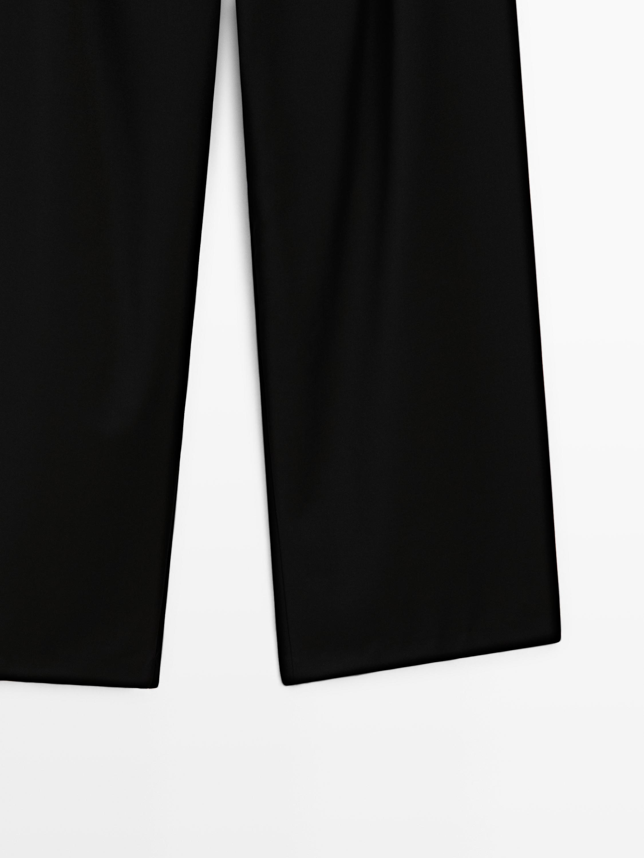 Pleated extra fine wool trousers