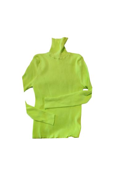 JERSEY FLUOR  NO ES CROPPER ES NORMAL