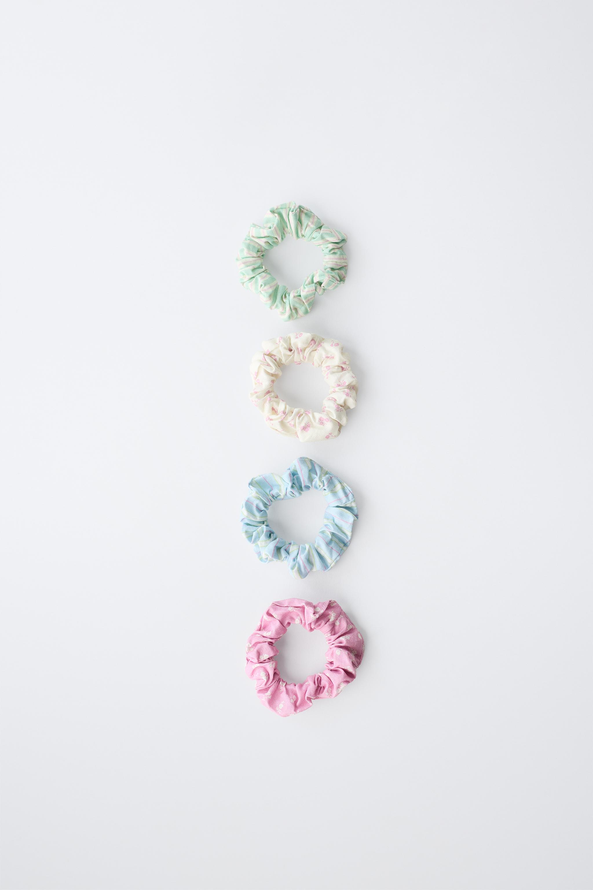FOUR-PACK OF STRIPED AND FLORAL SCRUNCHIES — Multicolored