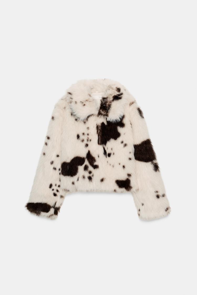 Front view of a brown and white jacket with a fur effect, animal print, lapel collar and long sleeves.