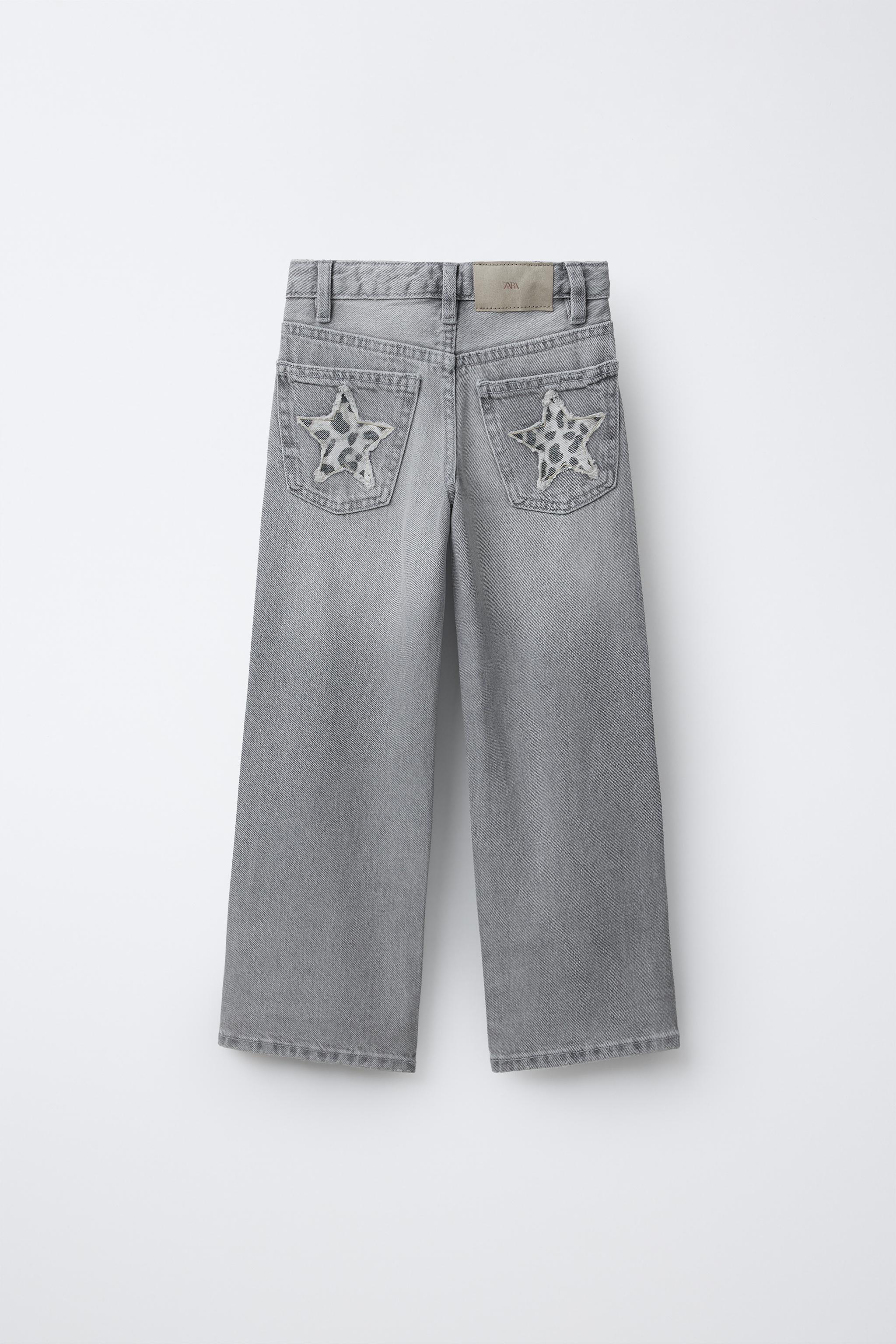 JEANS WIDE LEG PIÈCES ÉTOILES ANIMAL PRINT
