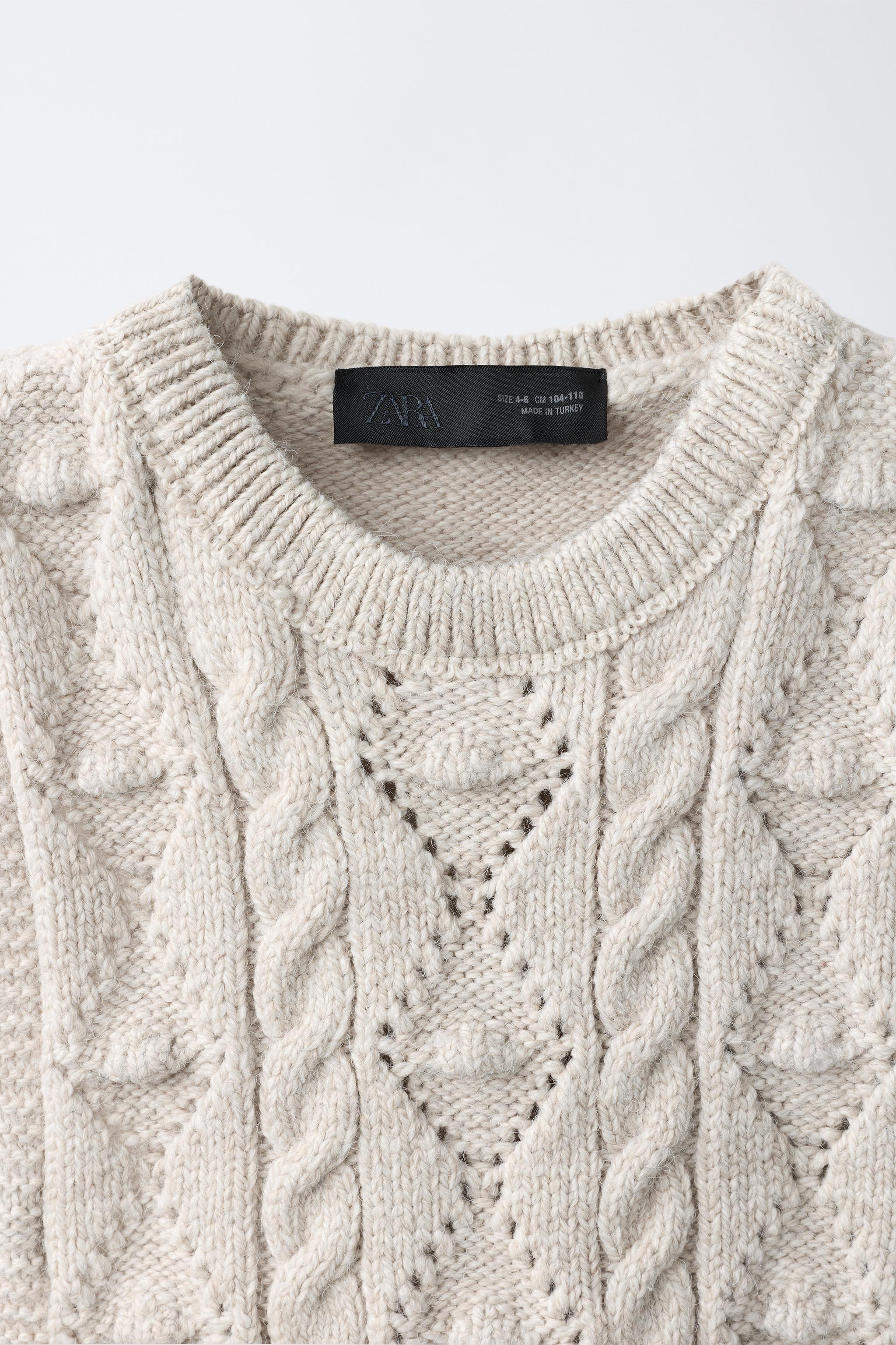 CABLE KNIT VEST
