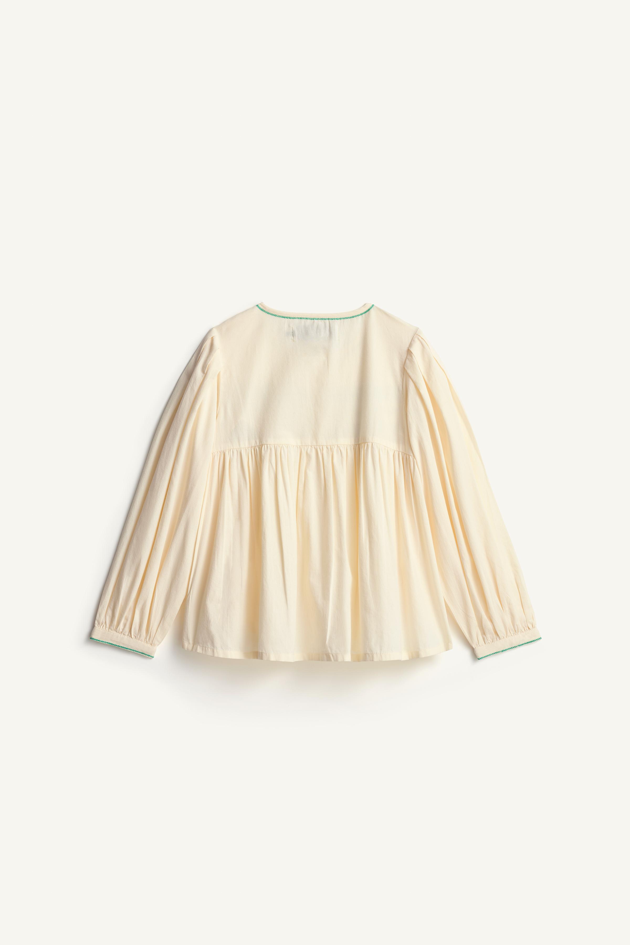 LIMITED EDITION SMOCKED BLOUSE
