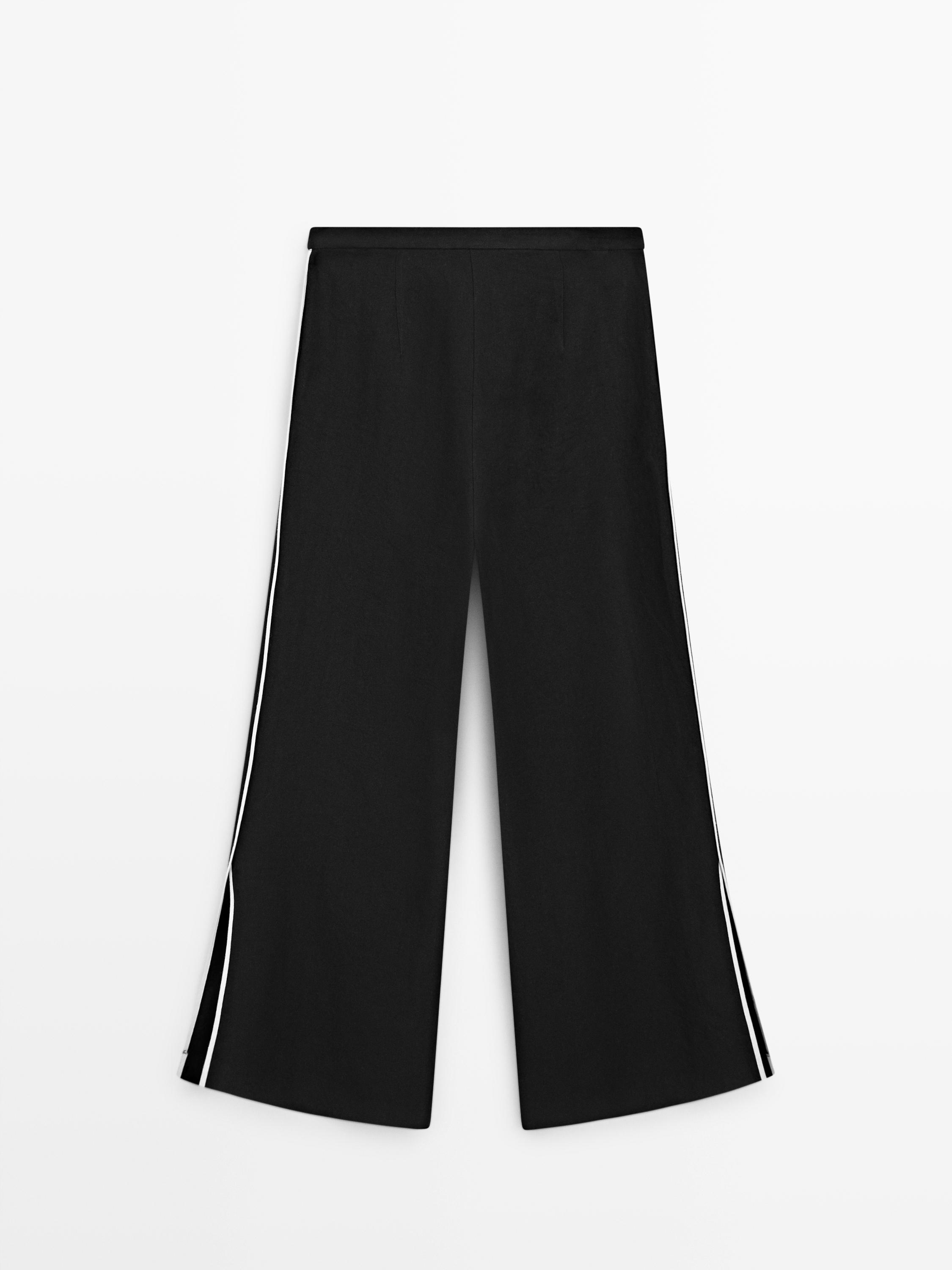 Pantalon en lin à ganse contrastée