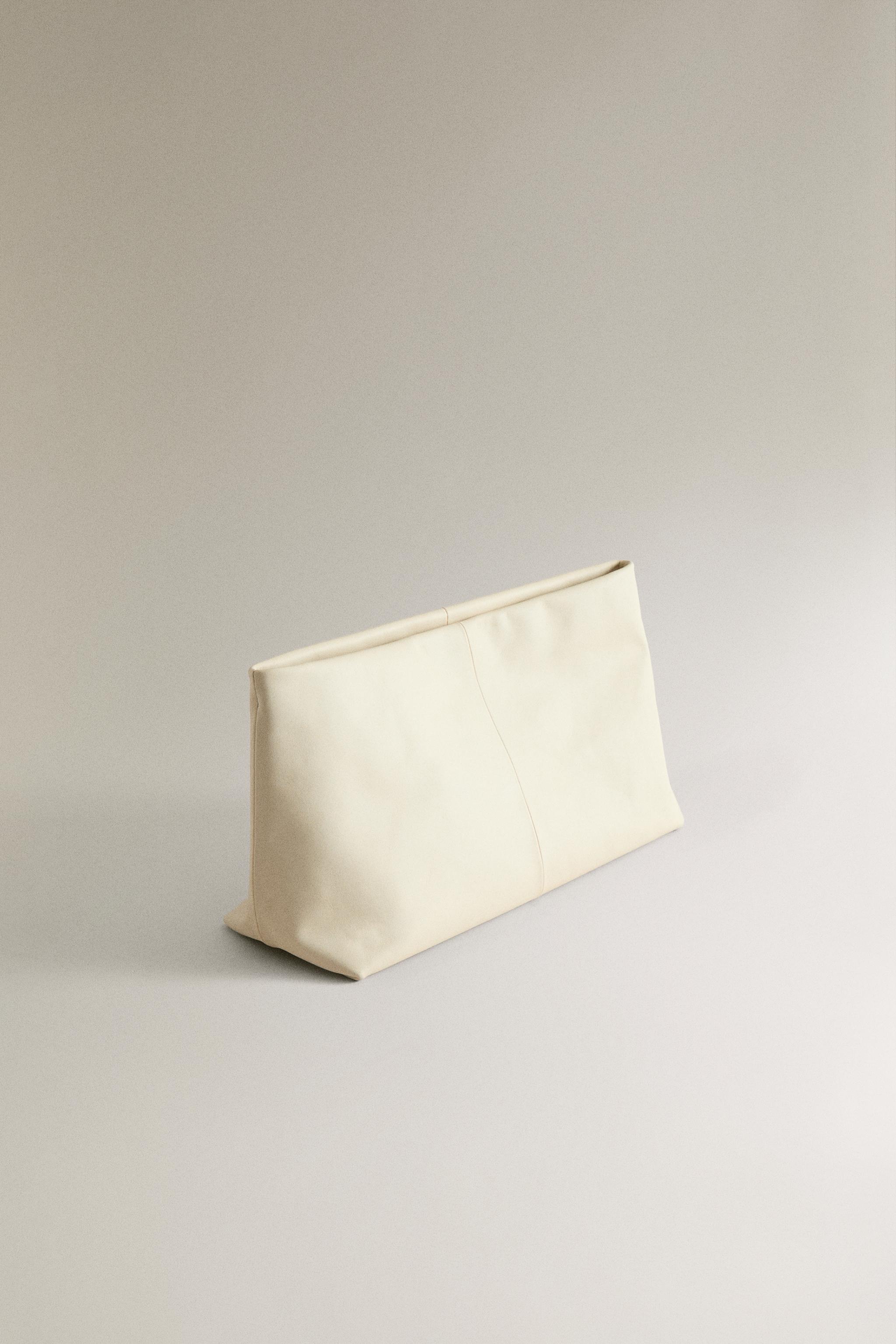 LEATHER MAKEUP BAG — 