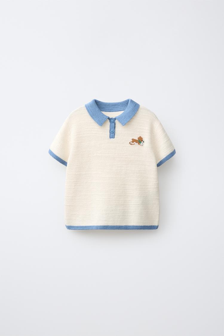 Polo punto perrito bordado