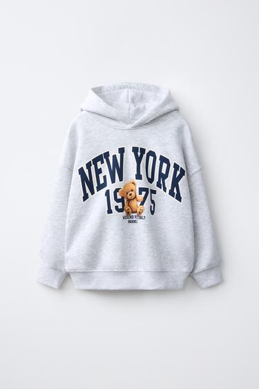 BLUZË HOODIE ME KAPUÇ DHE STAMPIM ARUSHI - Gri me cirka nga Zara