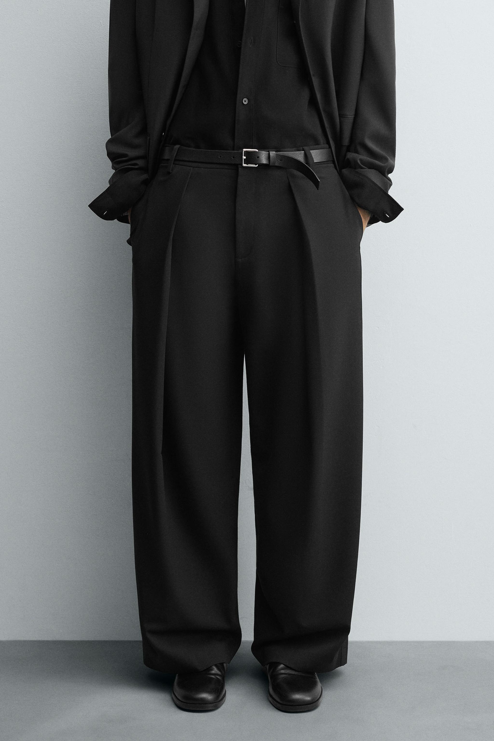 RELAXED FIT PLEATED PANTS