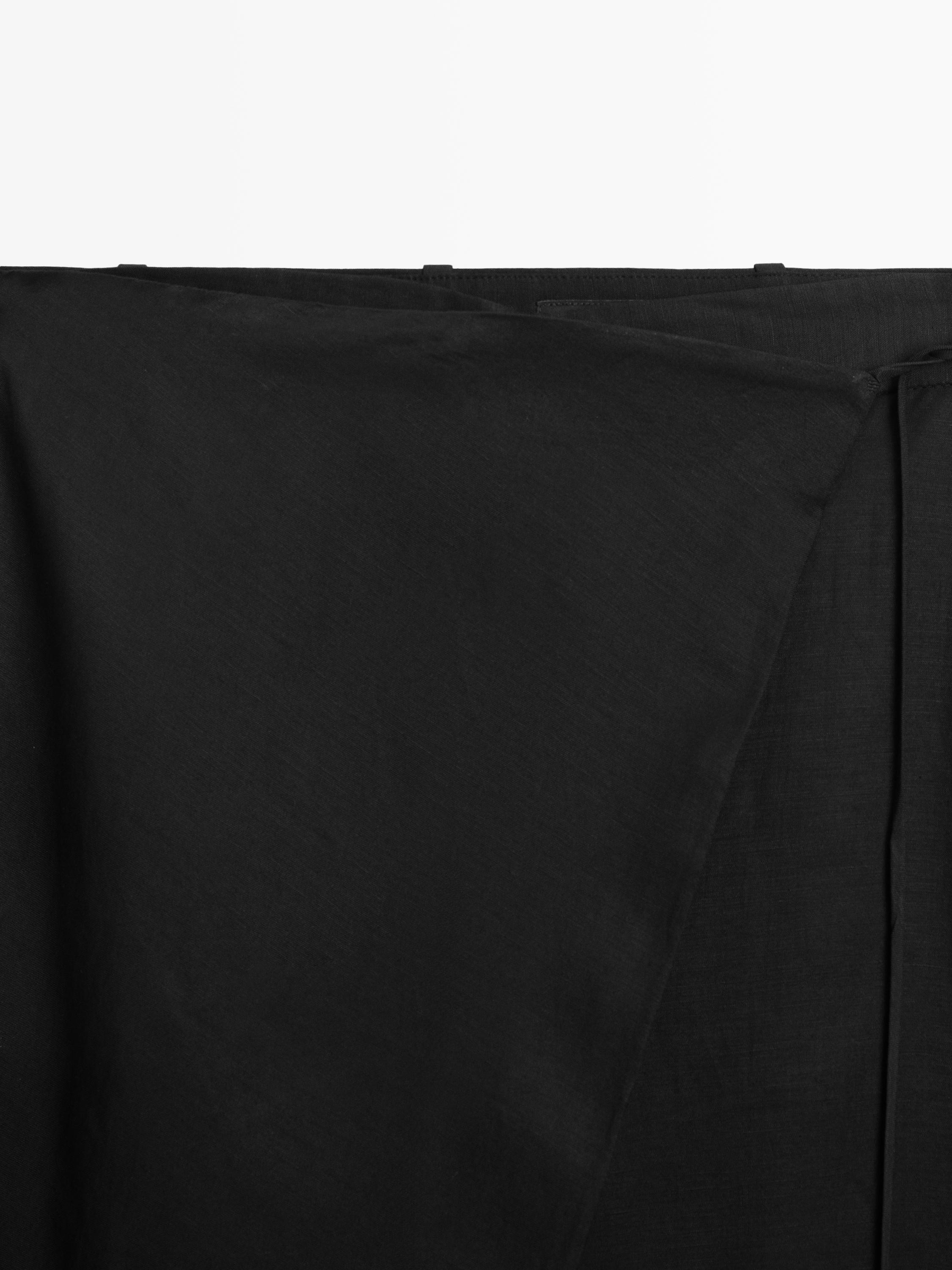 Flowing pareo trousers with tie detail