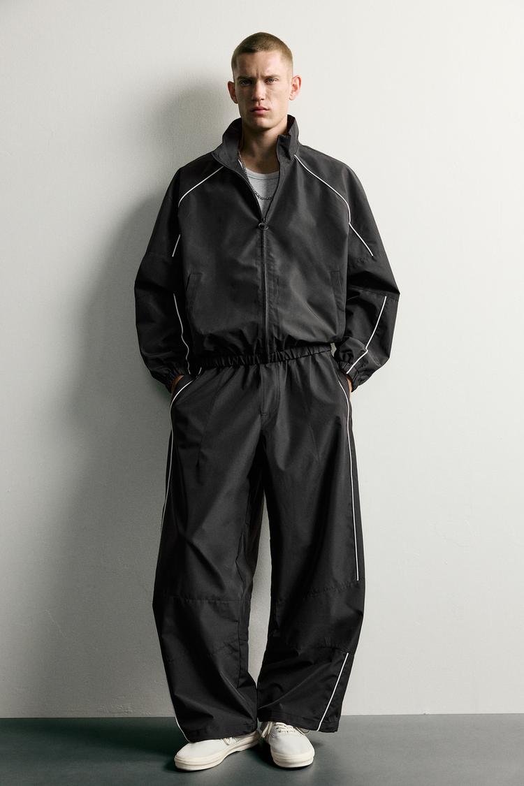 WATER-REPELLENT TECHNICAL CONTRAST JACKET — Black