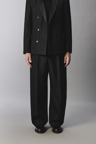 PANTALONS CURVED FIT DE VESTIT LIMITED EDITION - Negre de Zara