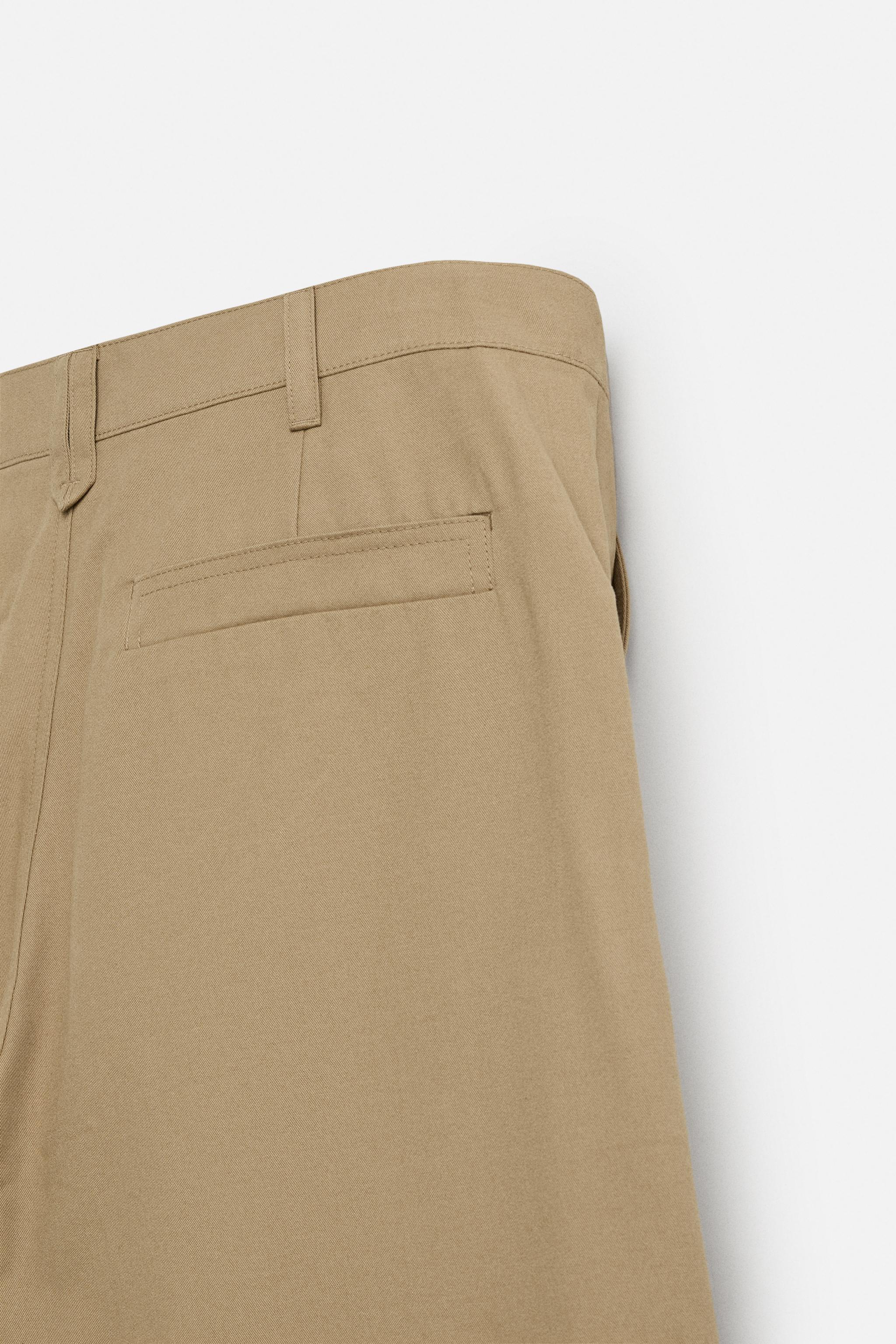 PLEATED WIDE FIT PANTS