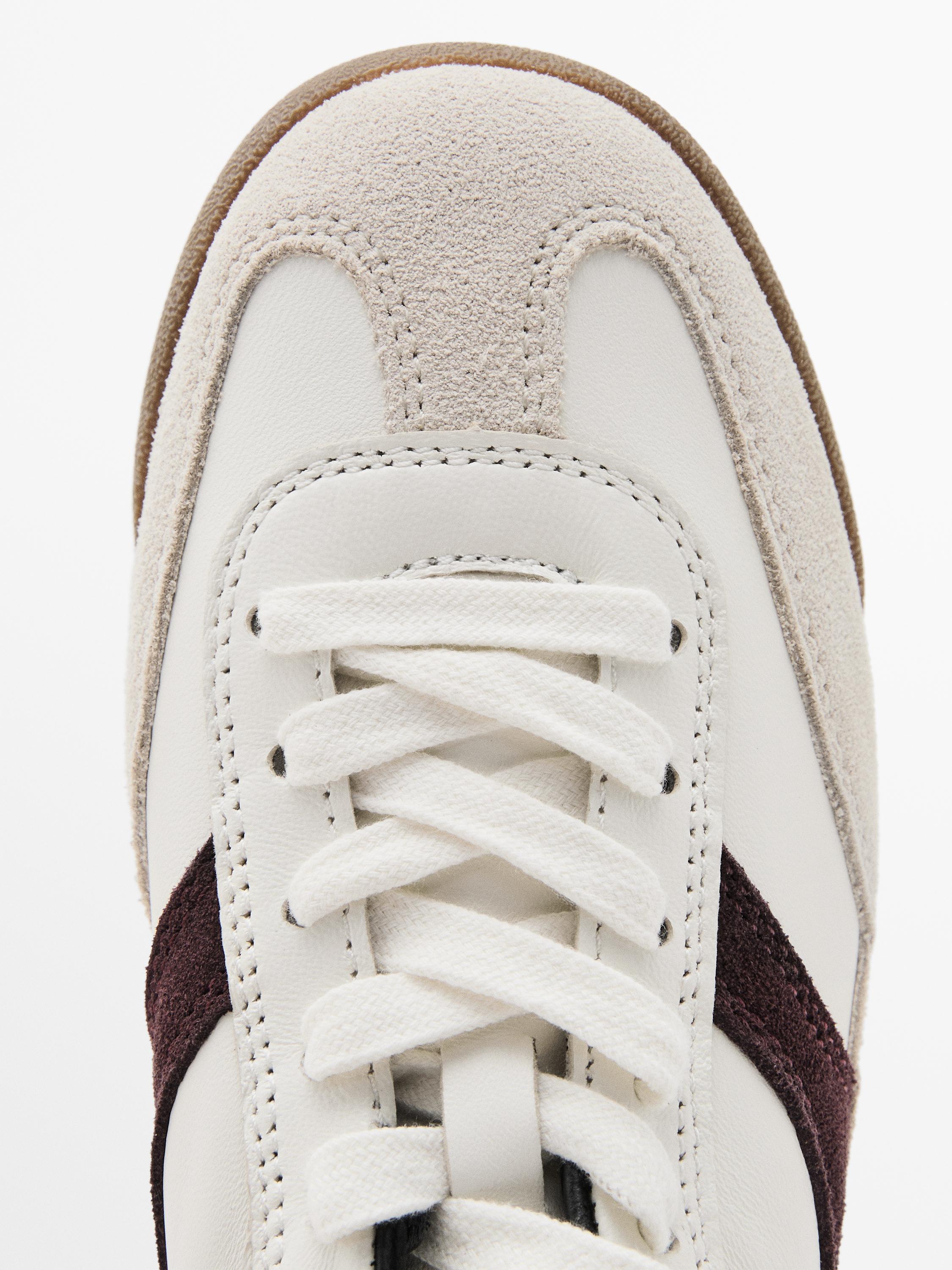 Tennis cuir contrastant