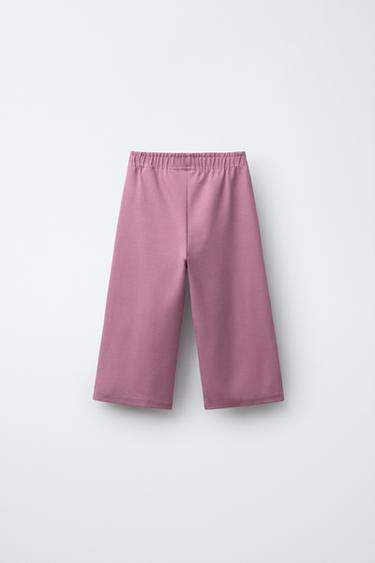 PANTALON EN MOLLETON WIDE LEG INSCRIPTION EN RELIEF - Rose foncé de Zara - Image 1