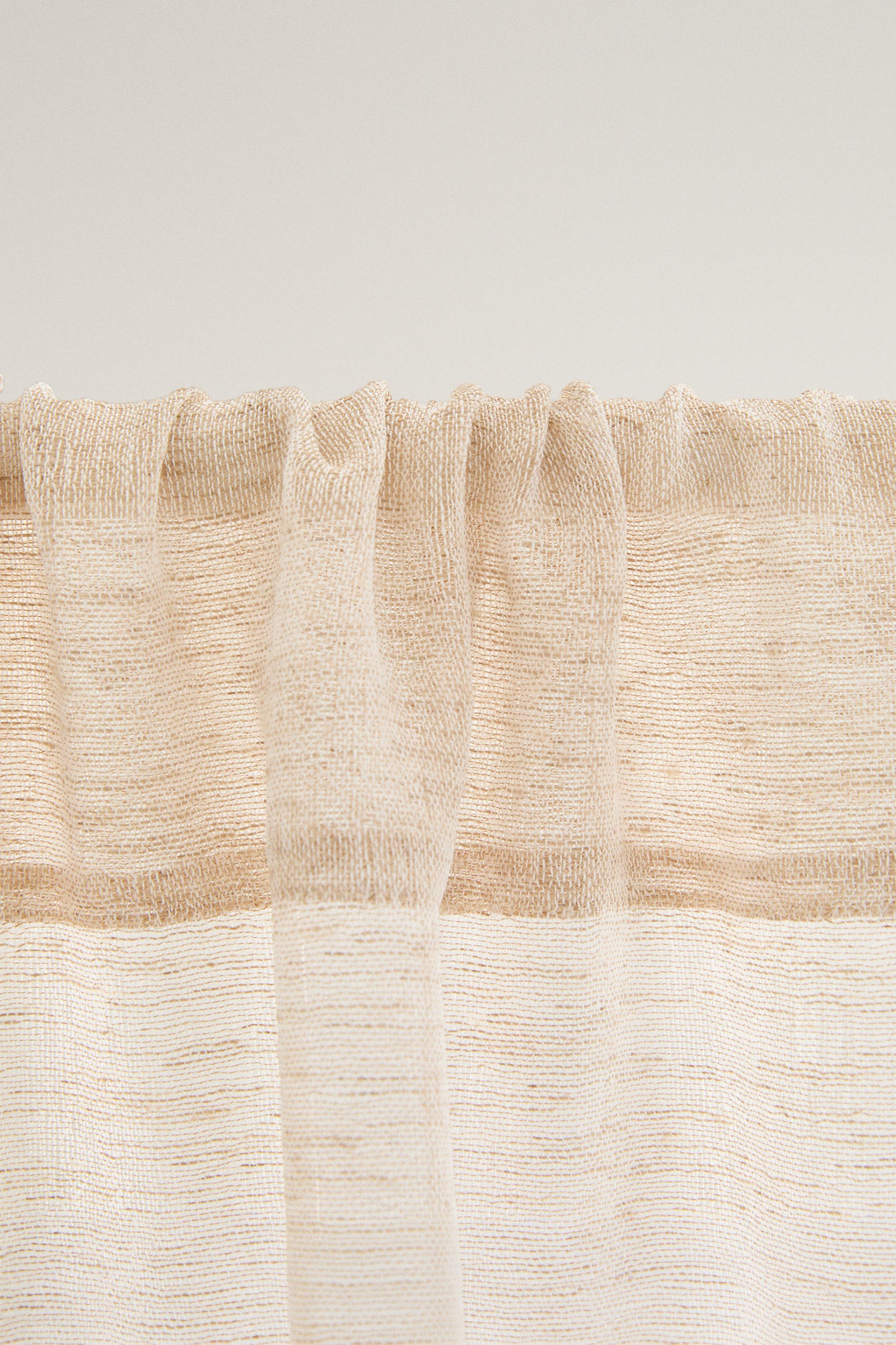 SHEER CURTAIN WITH LOW FILTRATION