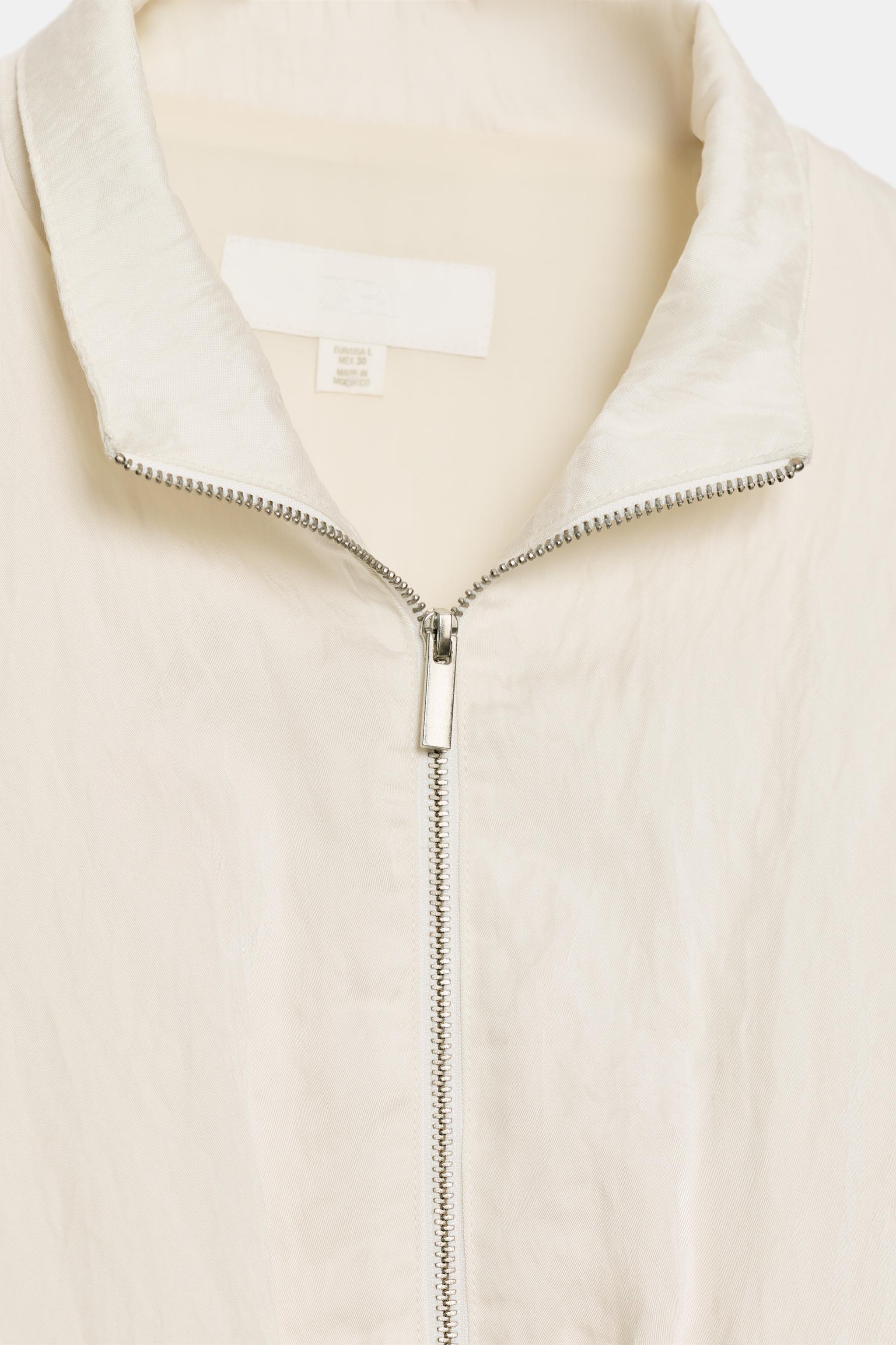 CRUMPLED EFFECT DRAWSTRING BOMBER JACKET