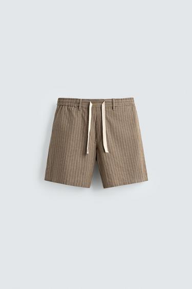 برمودا RELAXED FIT قطن - كتان - بني / خام الخاص بـ Zara