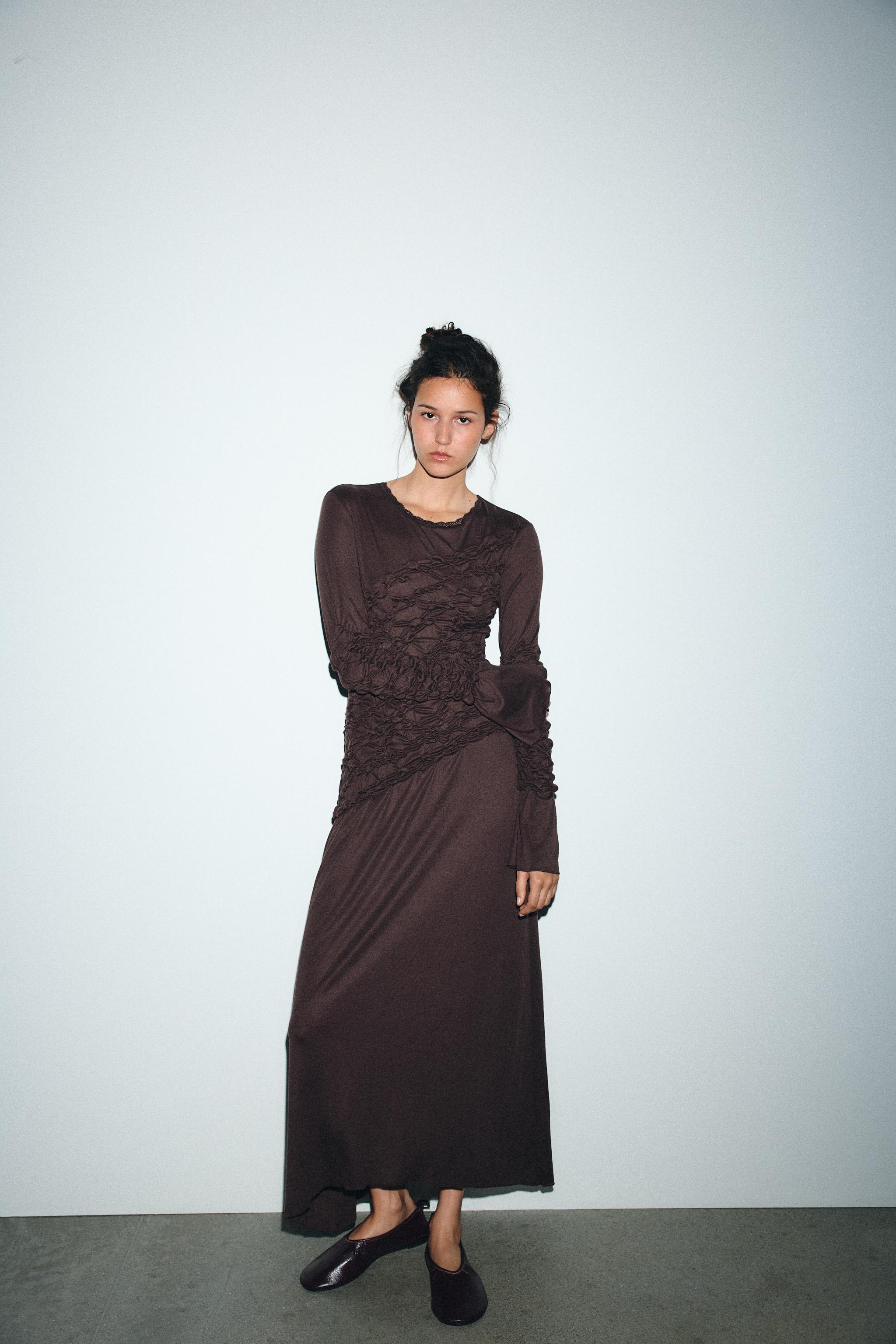 ROBE MI-LONGUE À PLIS