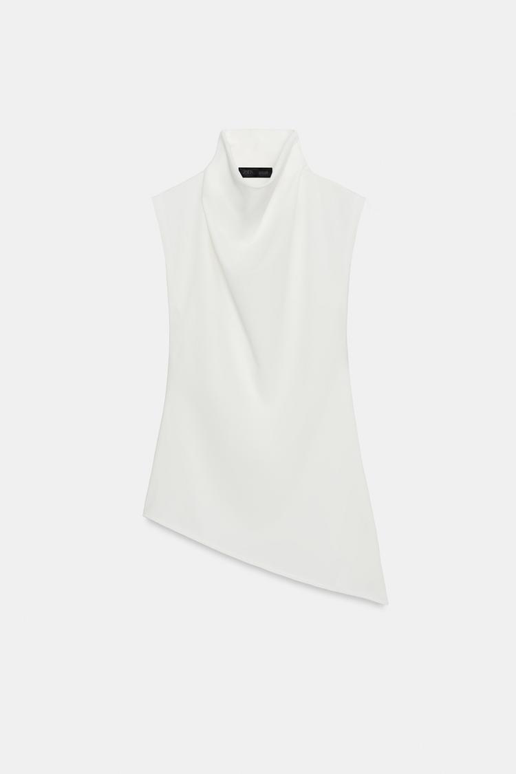 ASYMMETRIC FLOWING TOP
