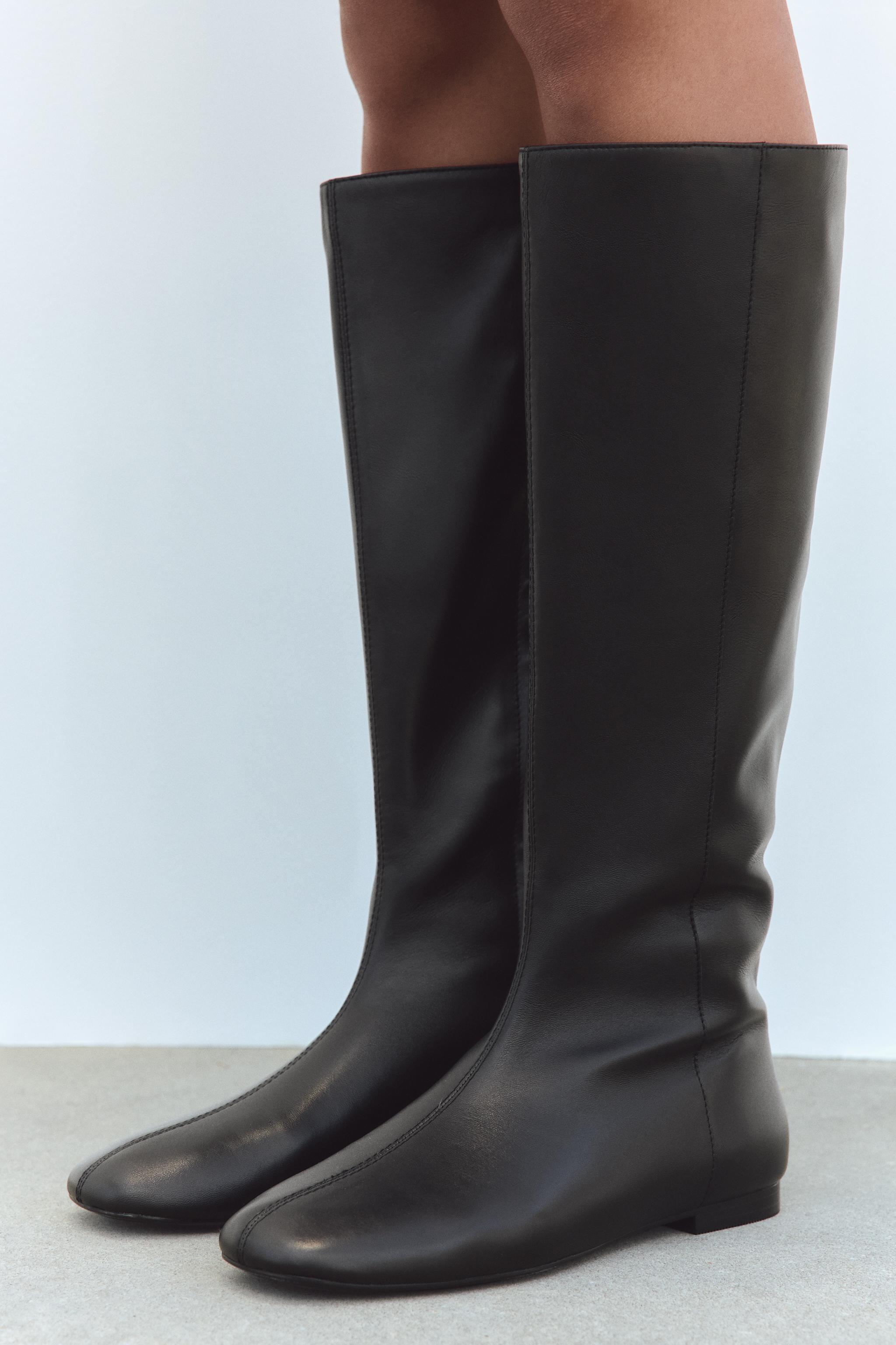 BOTTES PLATES EN CUIR