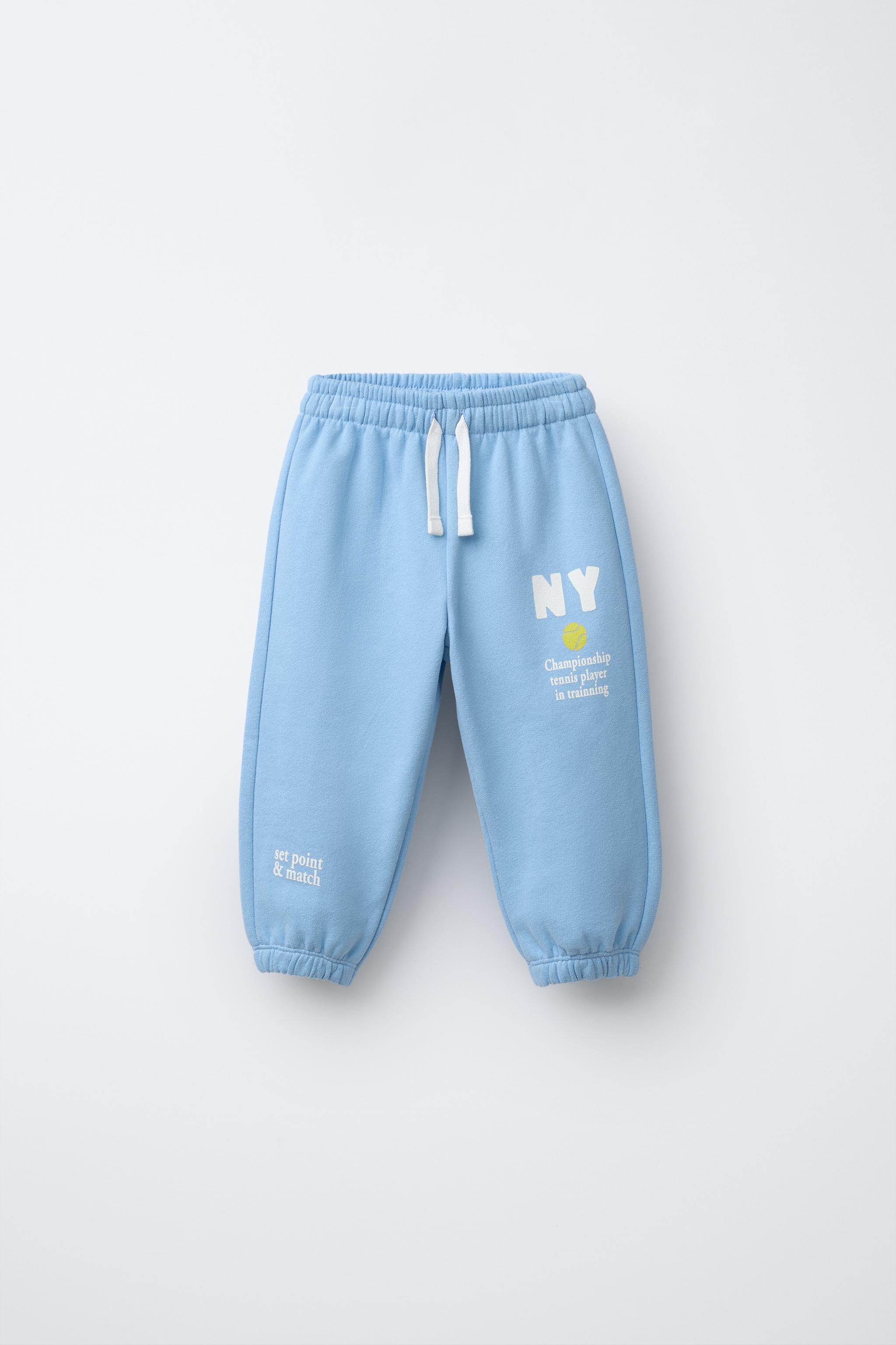 PLUSH JOGGING TROUSERS WITH SLOGAN - Light blue | ZARA Ireland