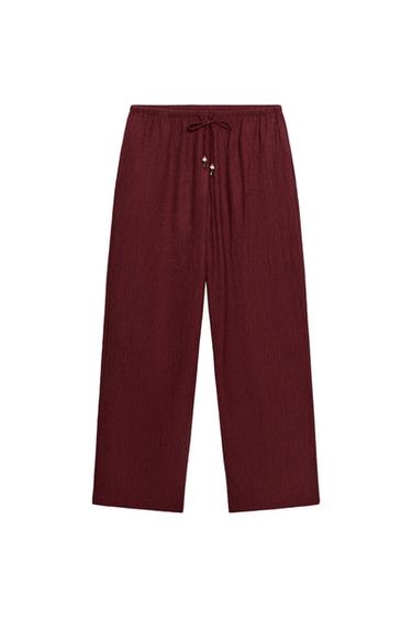 CALÇA TEXTURA COM LAÇO E MIÇANGAS - Borgonha da Zara