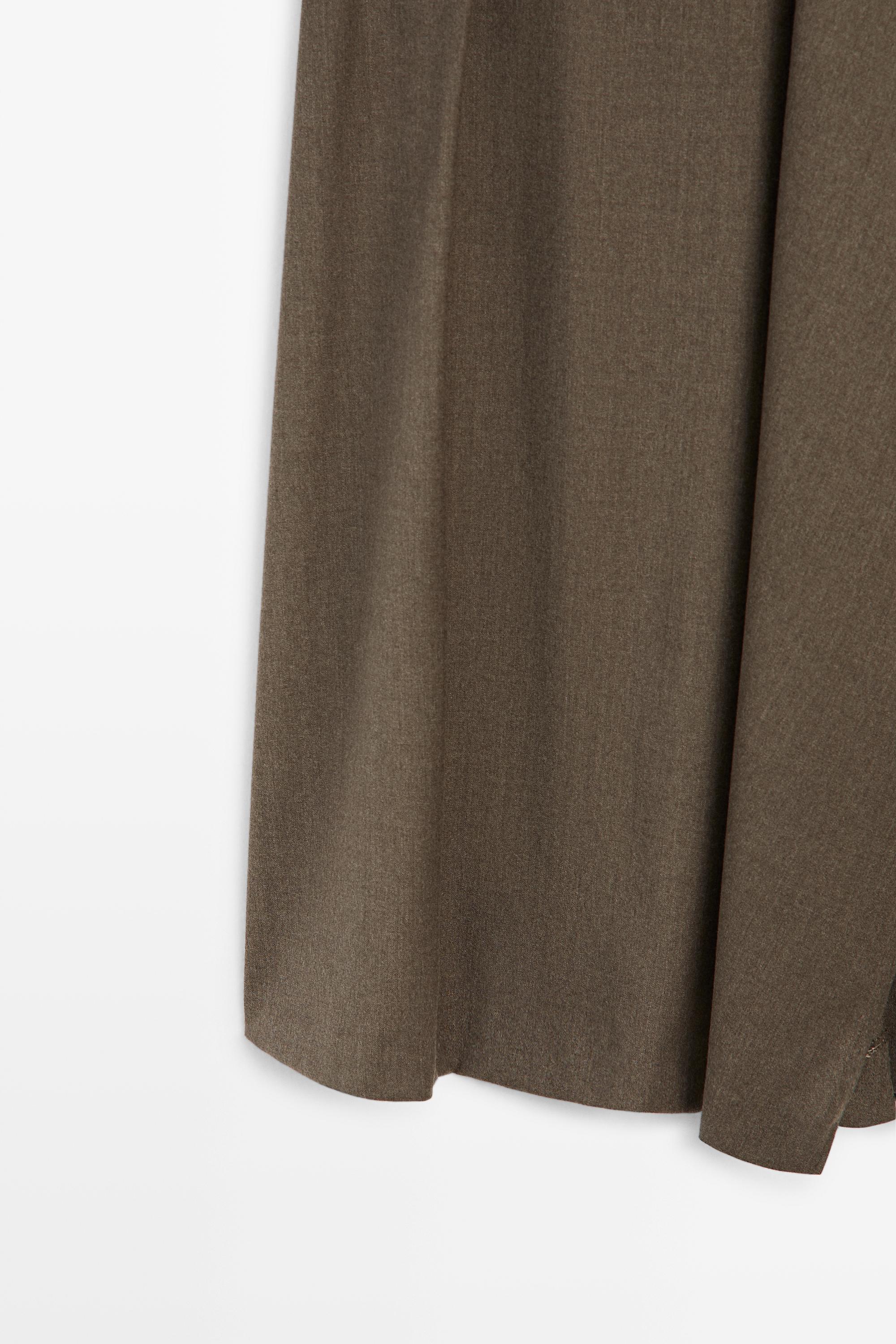 Jupe midi détail boucle