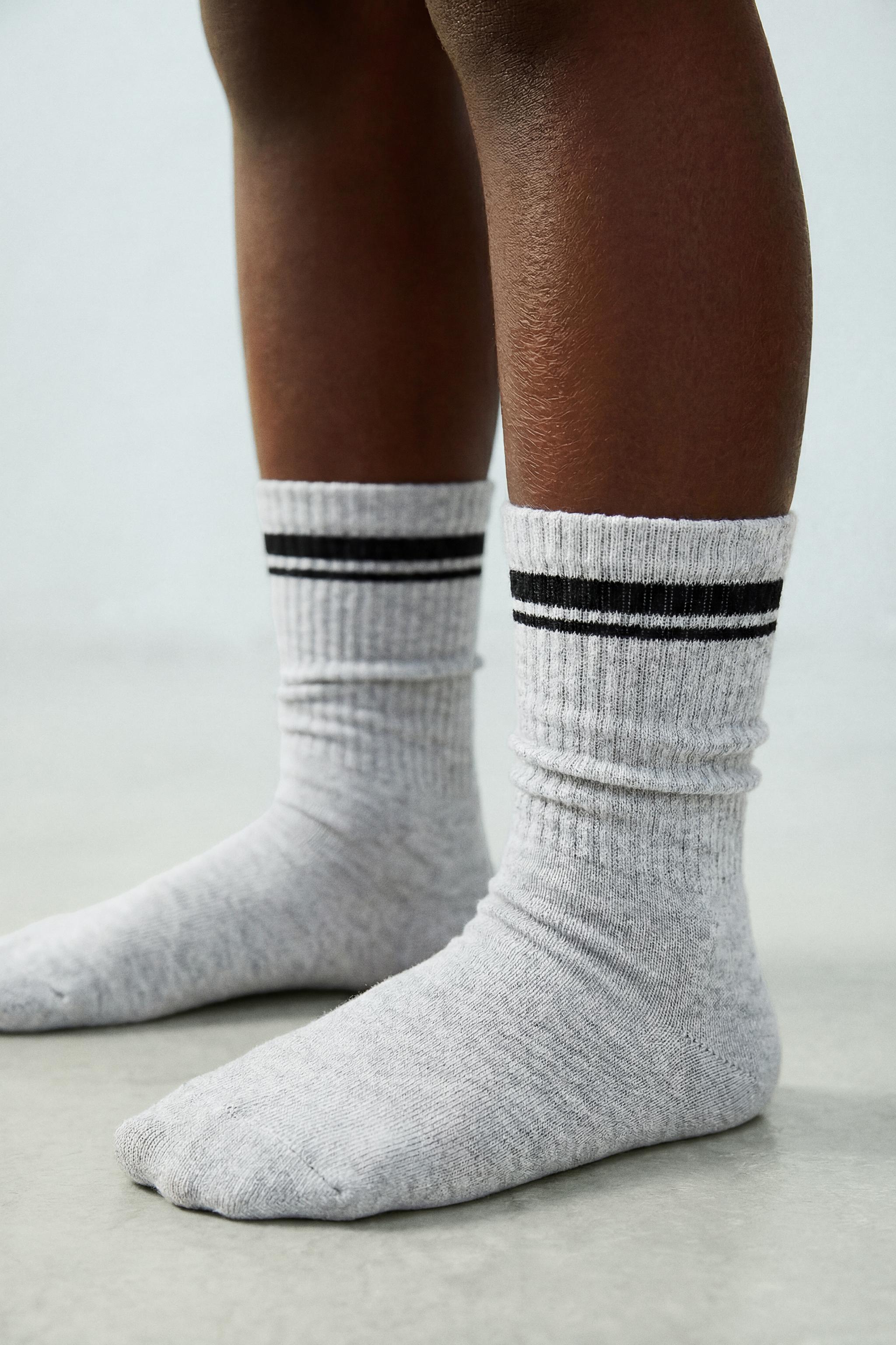 THREE-PACK OF SPORTY STRIPED HIGH SOCKS