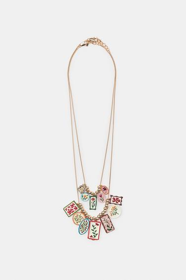 PACK OF 2 RESIN FLOWER CHARM NECKLACES - Golden by Zara