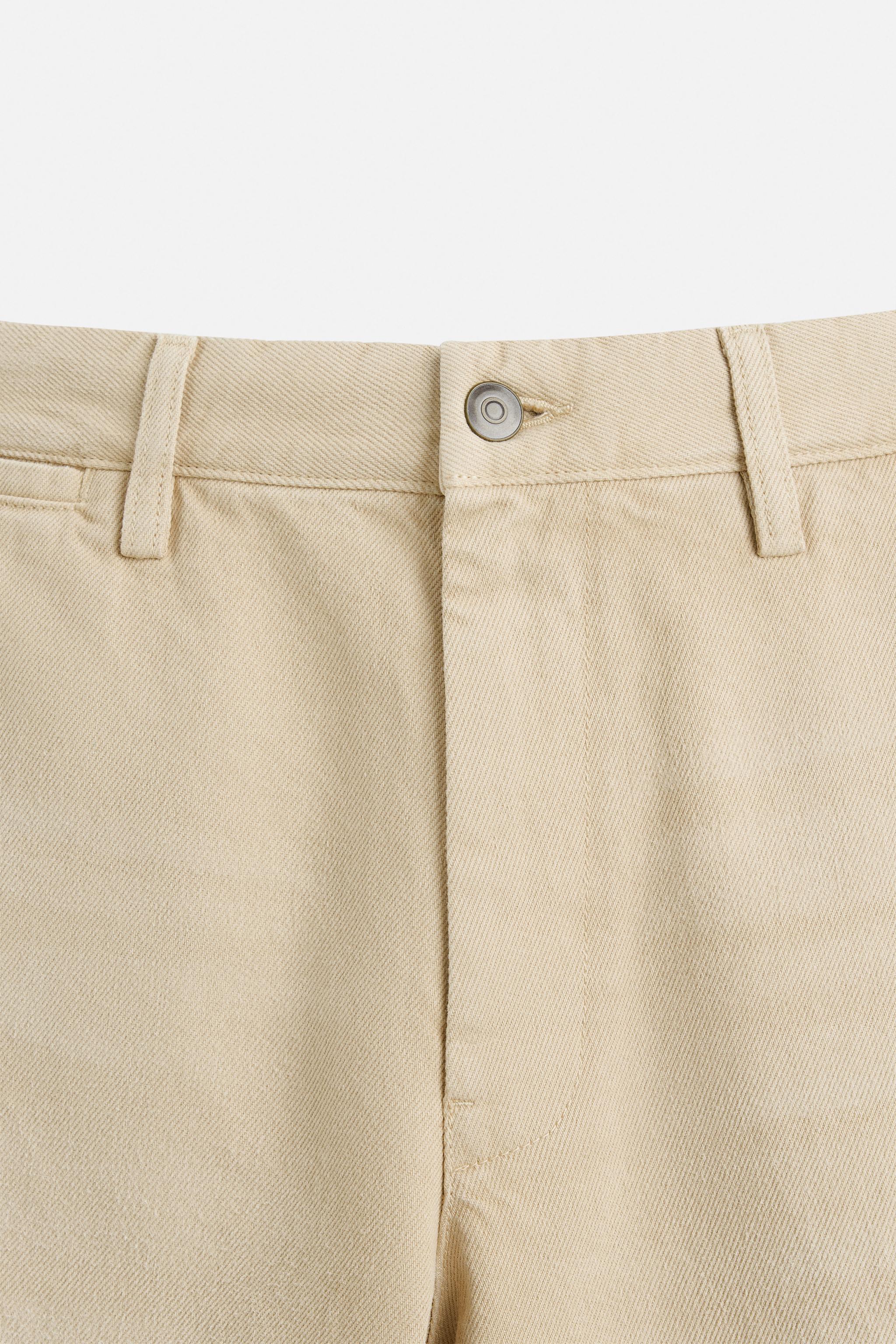 BAGGY FIT BERMUDA SHORTS © OTIS KWAME KYE QUAICOE