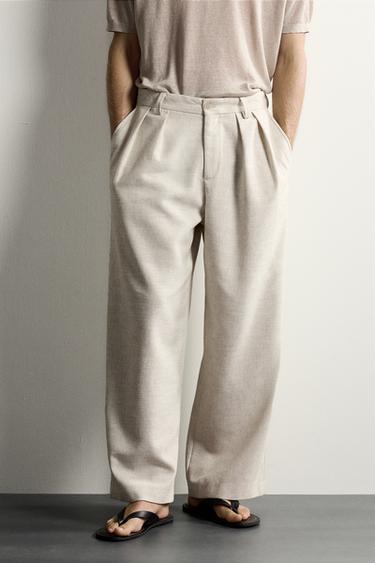 TEXTURED RELAXED FIT PLEATED TROUSERS - Light beige by Zara