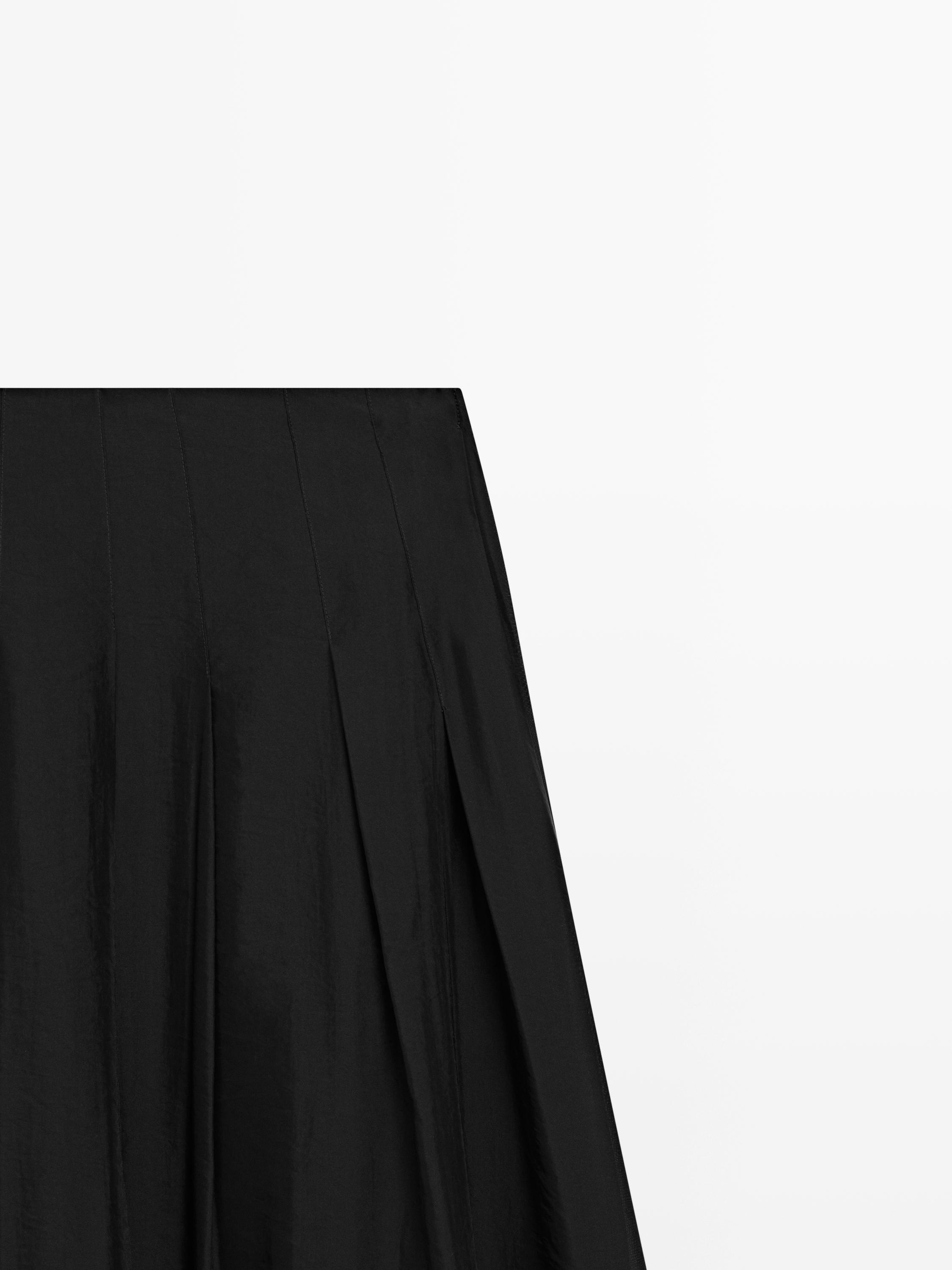 Flowing midi skirt with pintucks