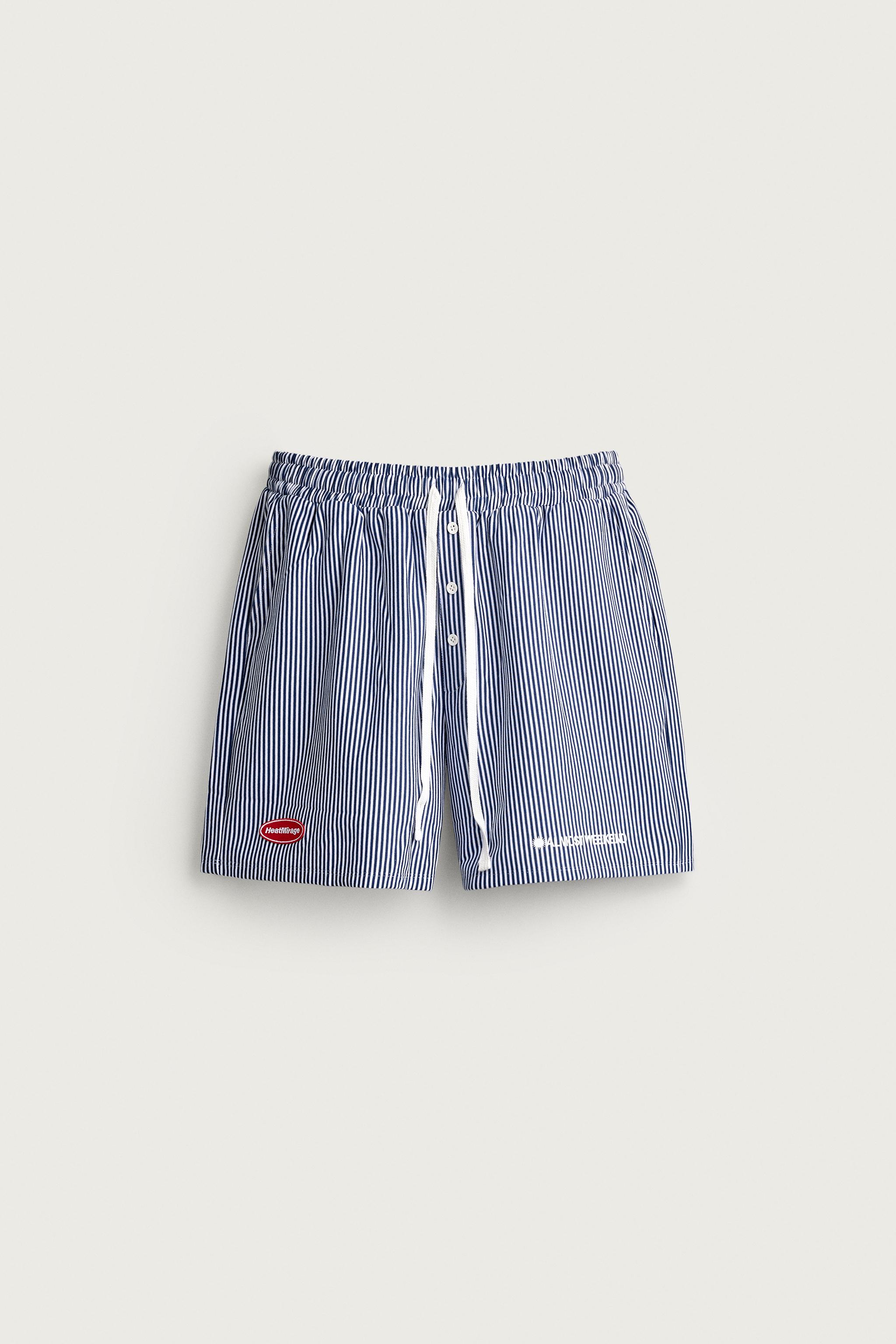 RELAXED FIT STRIPED PATCH BERMUDA SHORTS — Blue / White