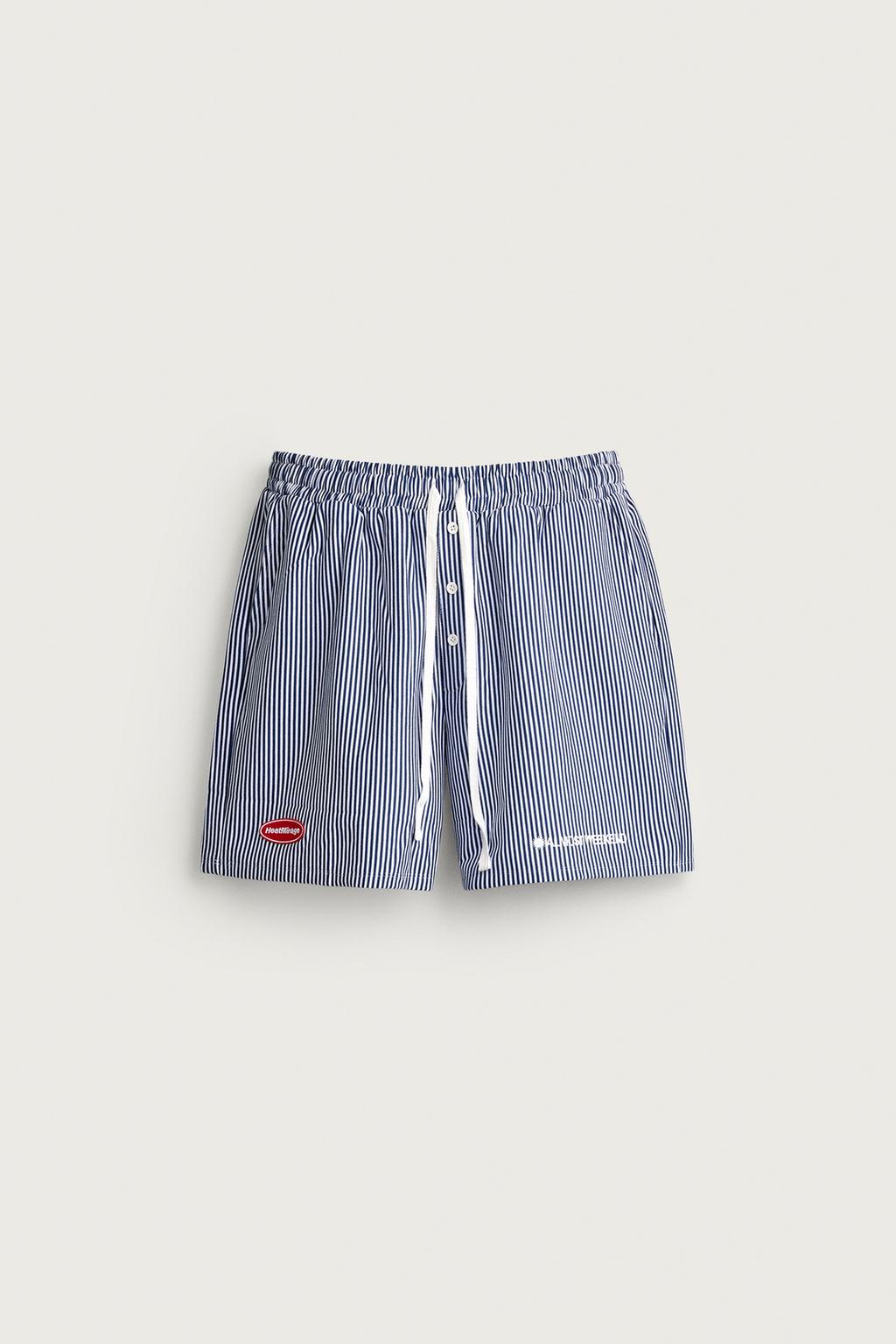 STRIPED PATCHWORK RELAXED FIT BERMUDA SHORTS
