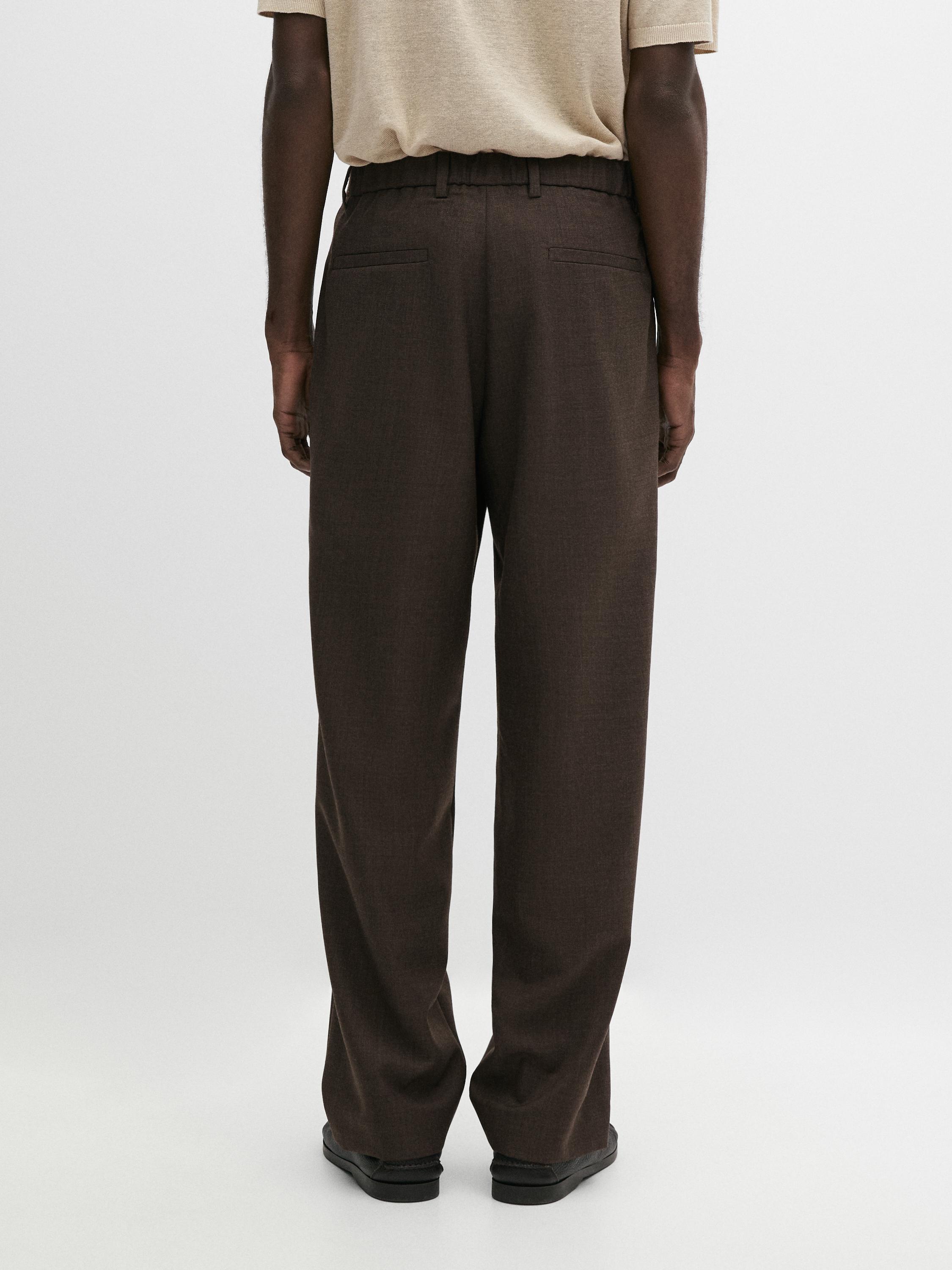 Pantalon à pinces en laine