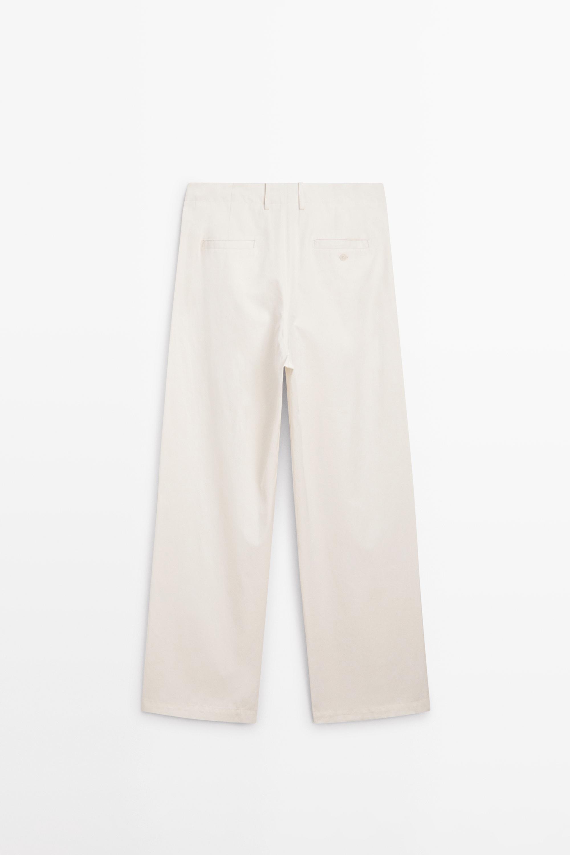 Pleated trousers with crossover fastening - STUDIO
