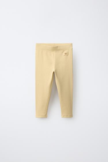 LABEL DETAIL RIBBED LEGGINGS — Ocher 1