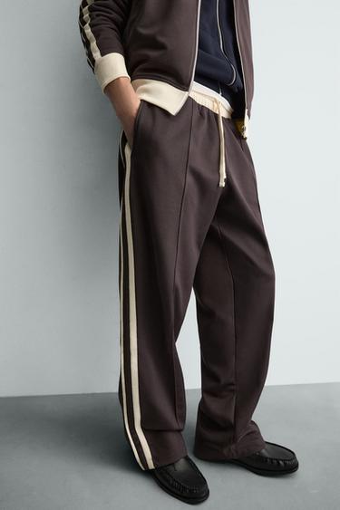 PANTALONI JOGGER WIDE FIT CU BENZI - Grena închis de la Zara