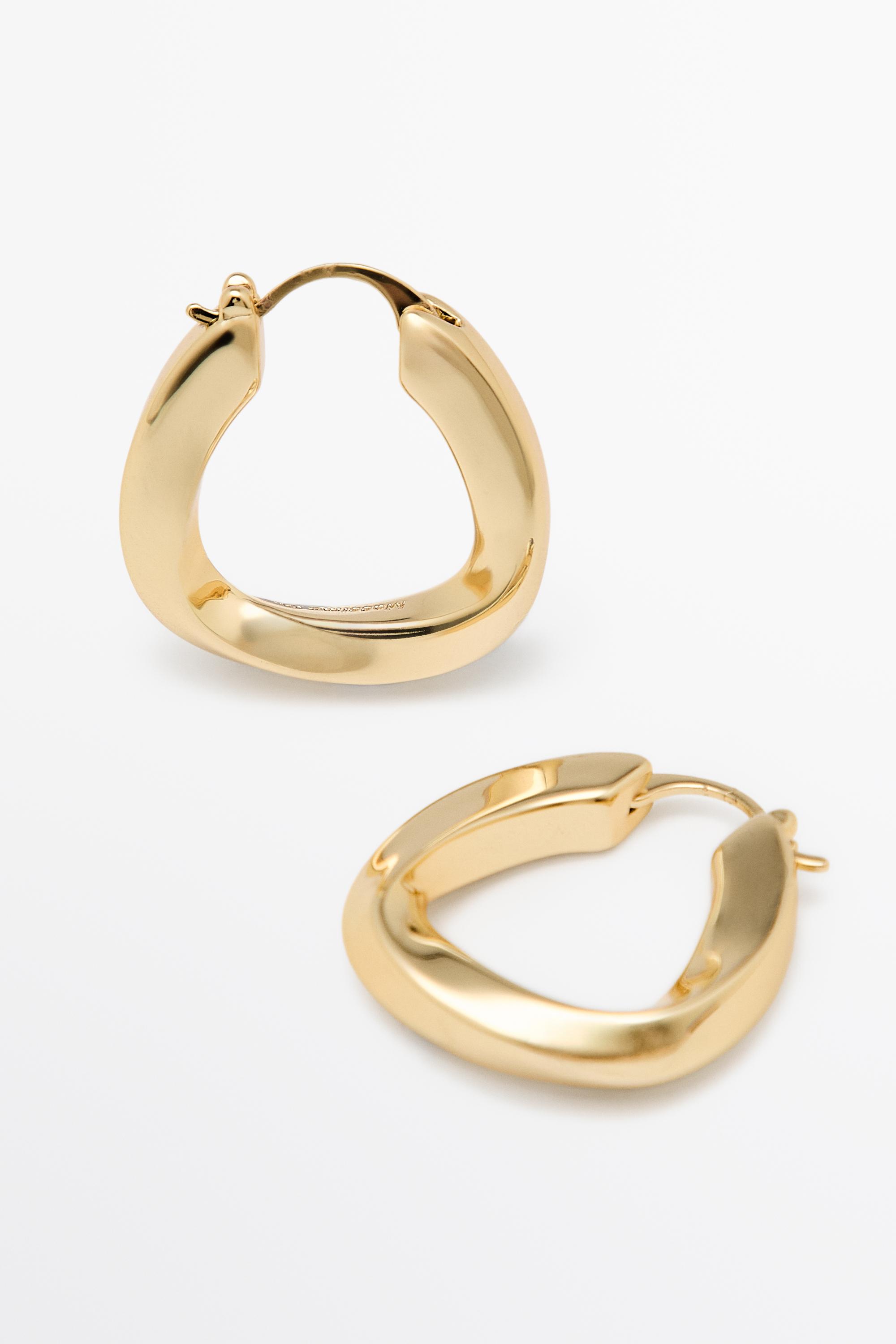 Triangular hoop earrings — Golden