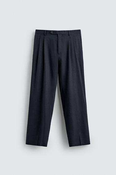 بنطلون بثنيات فيت مريح 100% صوف - بحري by Zara
