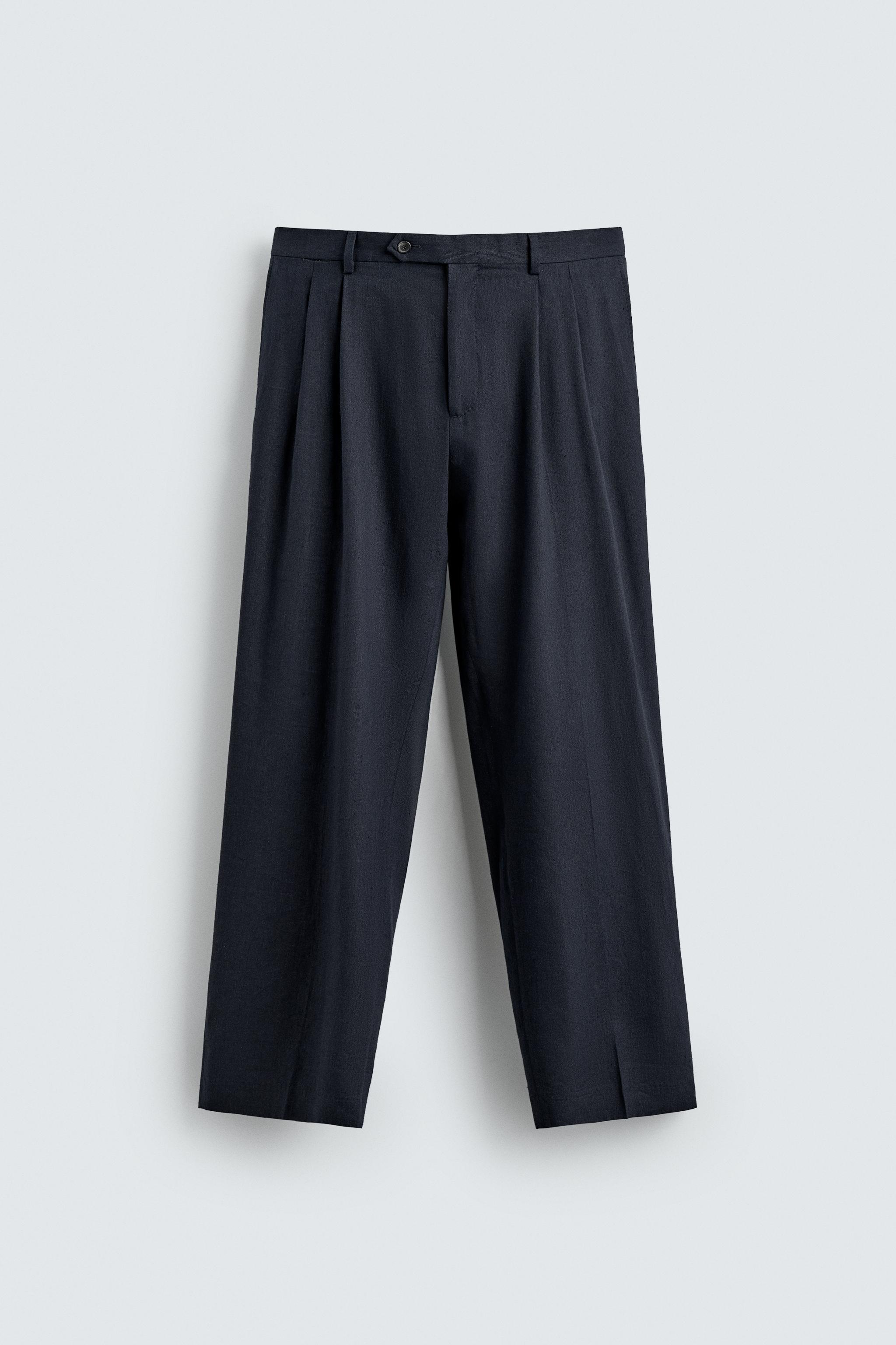 100% WOOL RELAXED FIT PLEATED PANTS