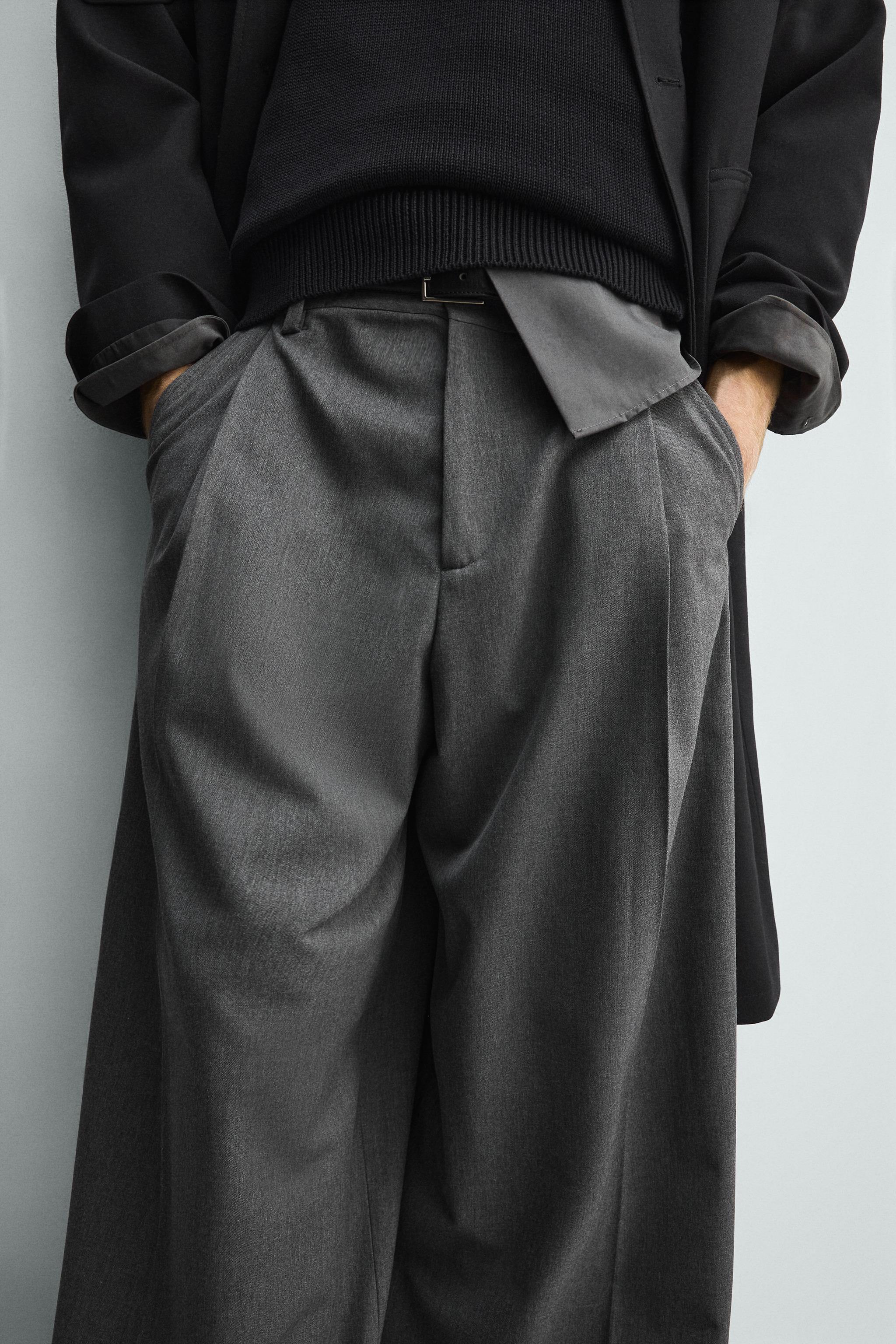 PLEATED WIDE FIT PANTS