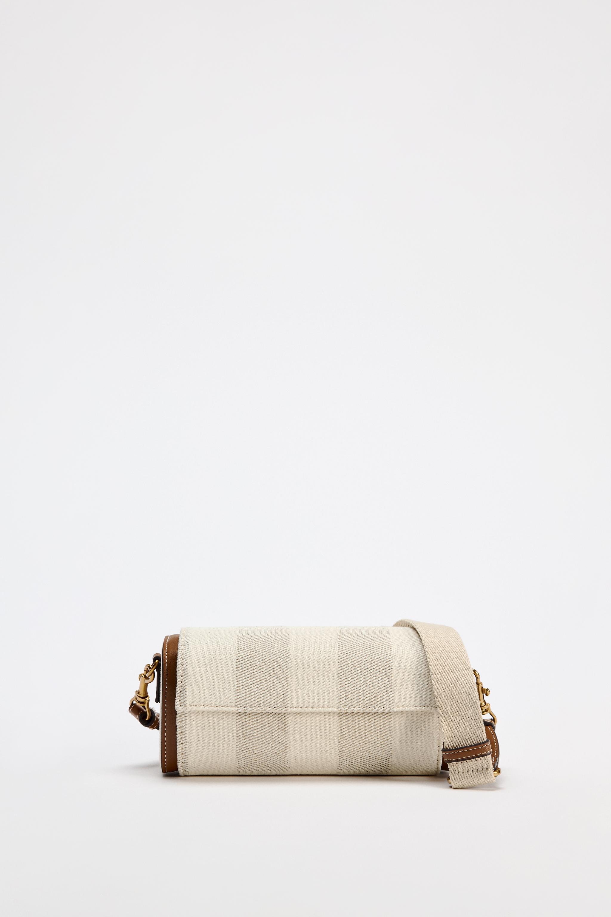 Burberry carteras zara hotsell