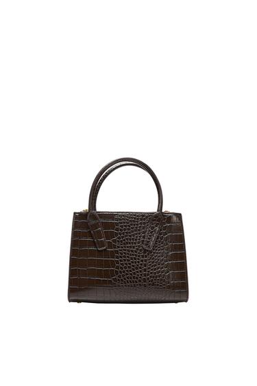 Structured dark brown crocodile-effect handbag with two top handles on a white background.