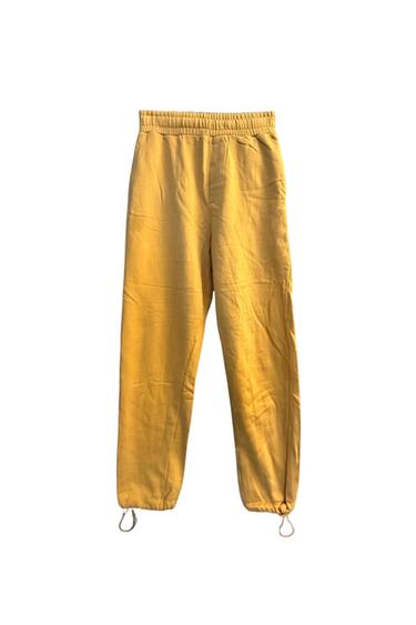 PANTS MADE OF COTTON WITH UNBRUSHED INTERIOR. ADJUSTABLE ELASTIC DRAWSTRING