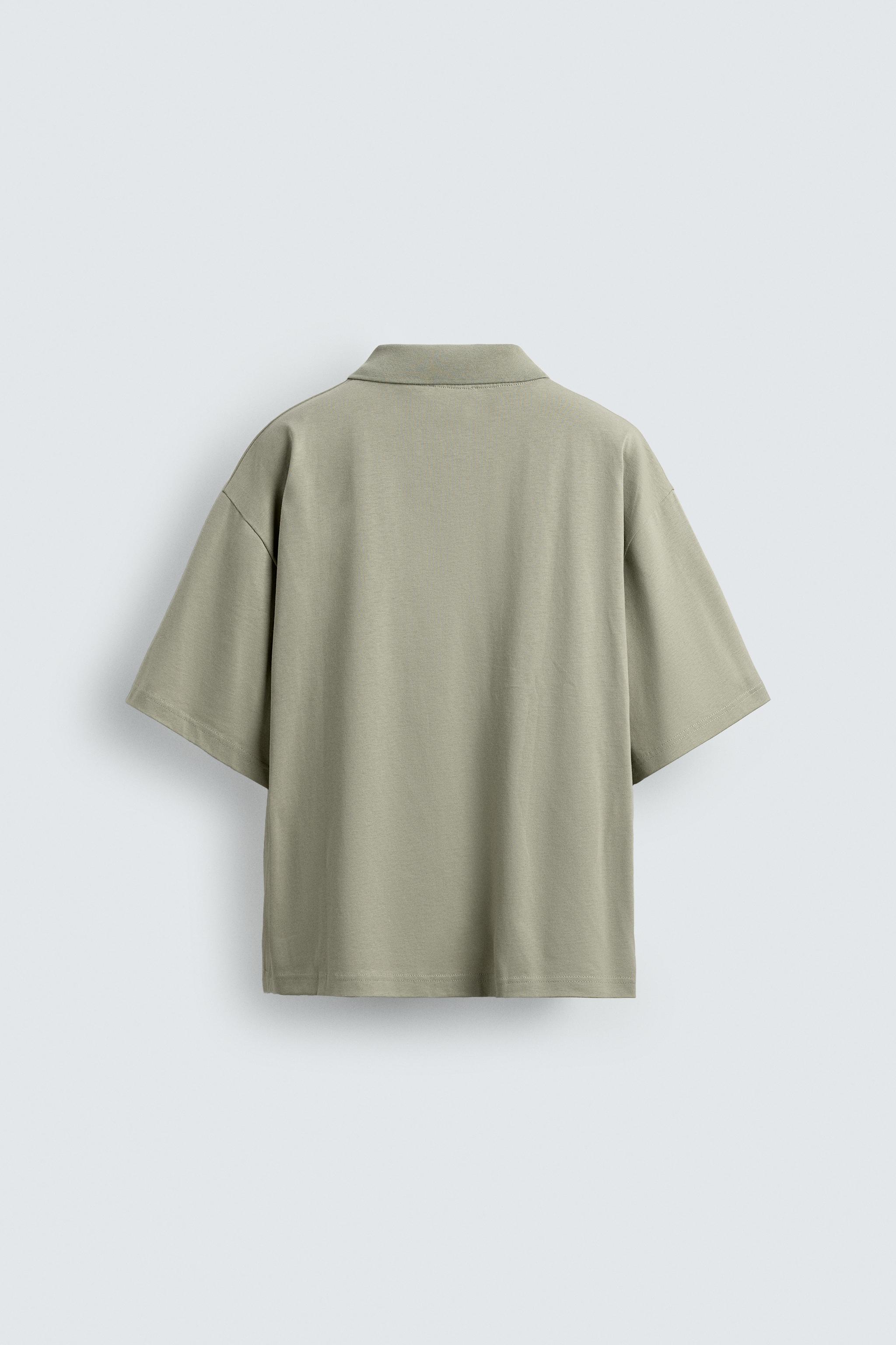 POLO RELAXED FIT TEXTE IMPRIMÉ